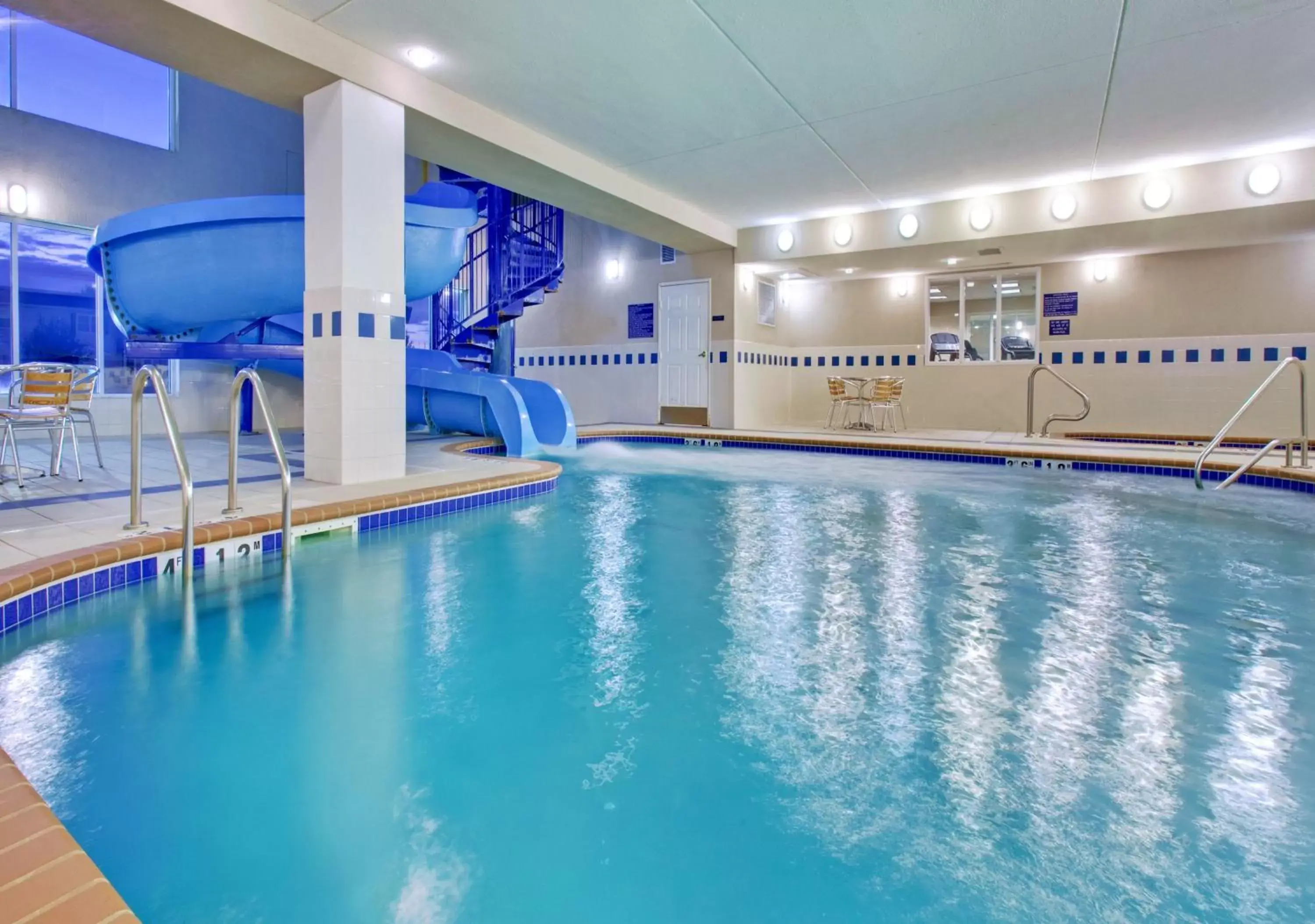 Swimming Pool in Holiday Inn Express & Suites - Dickinson, an IHG Hotel