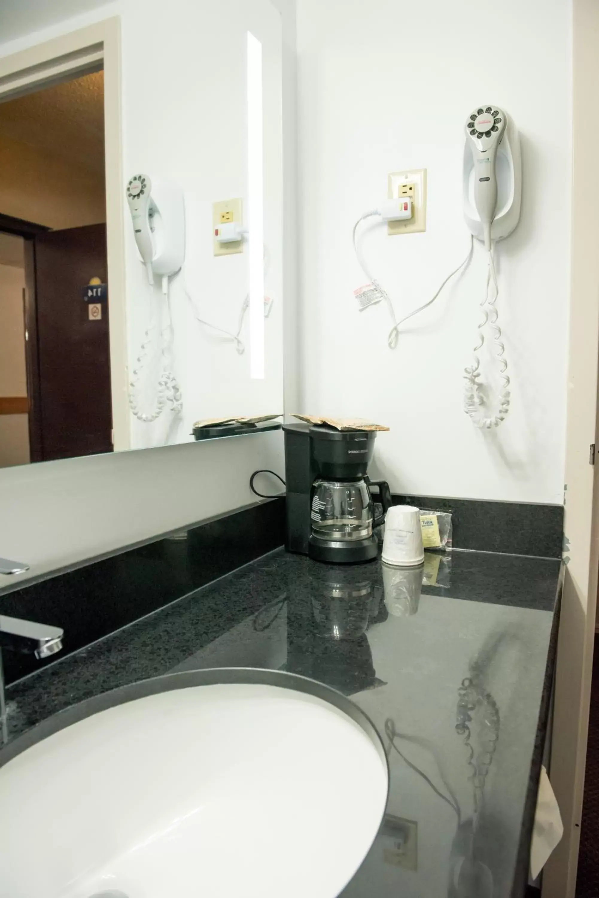 Bathroom in Howard Johnson by Wyndham Portage La Prairie