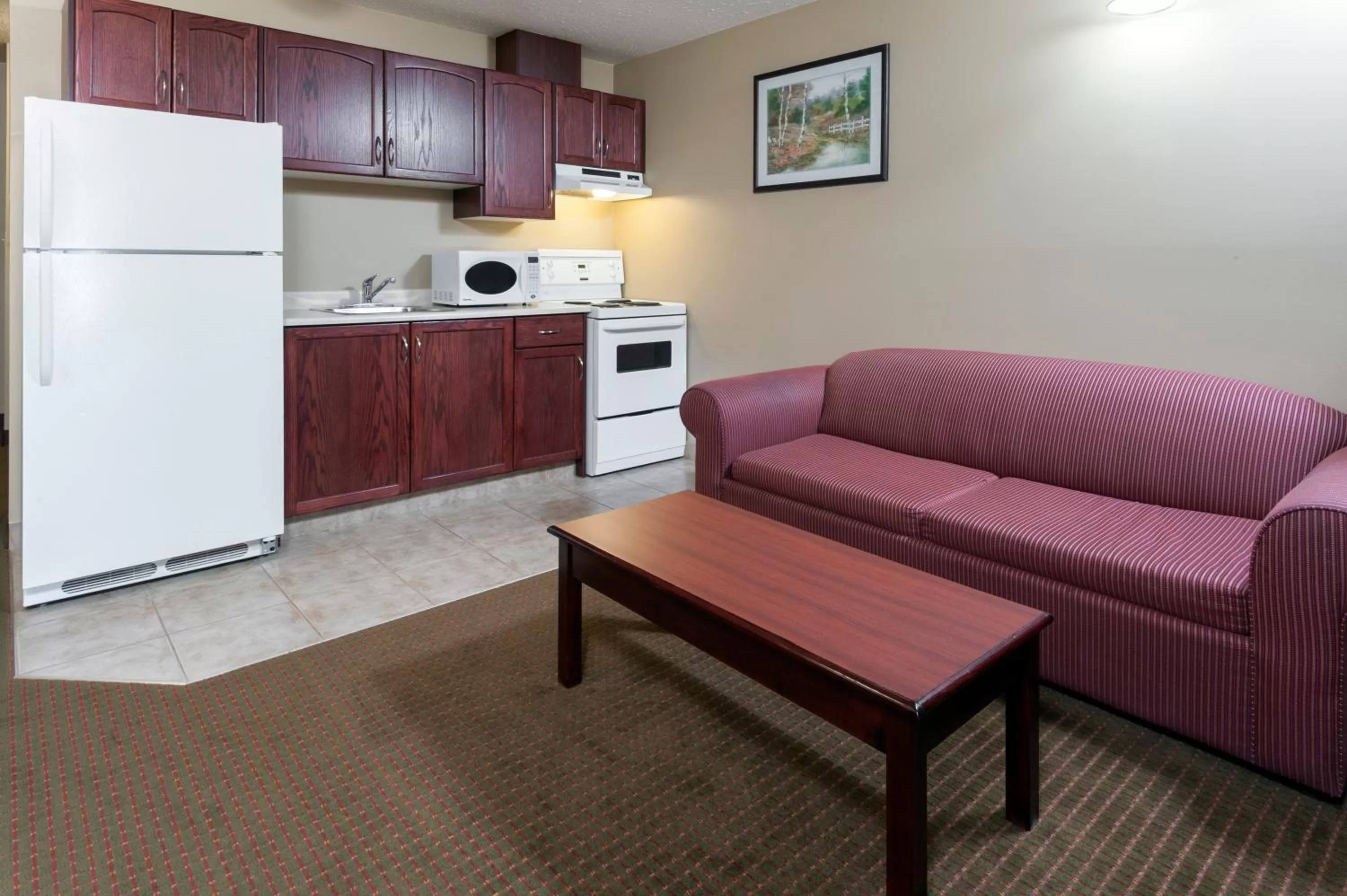 Kitchen or kitchenette in Super 8 by Wyndham Fort Saskatchewan