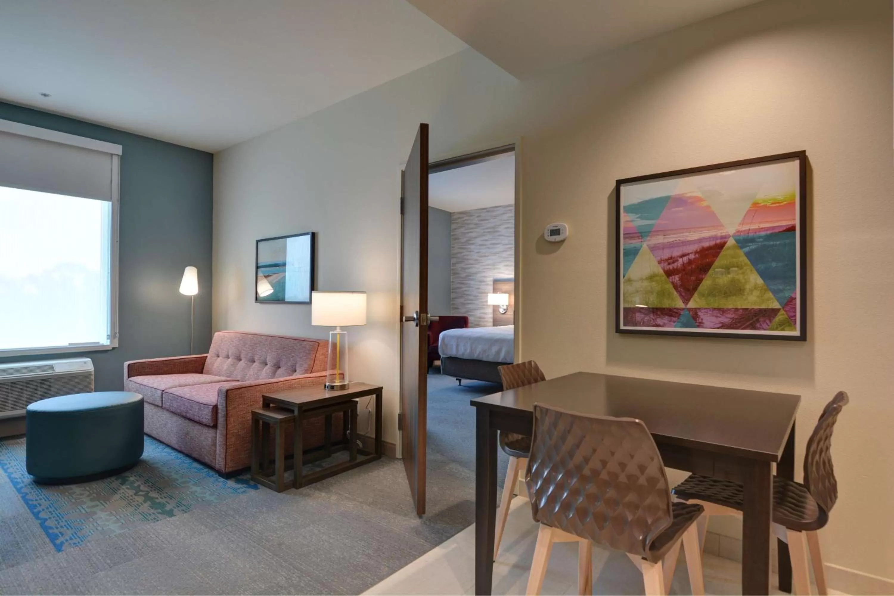 Living room, Bed in Home2 Suites By Hilton Panama City Beach, Fl