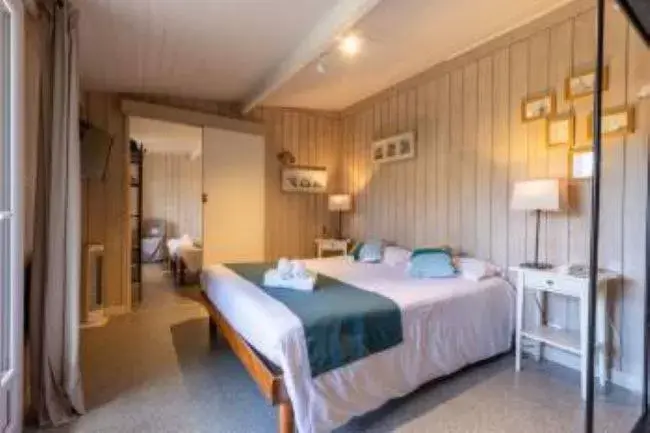 Photo of the whole room, Bed in Hôtel Le Grain de Sable