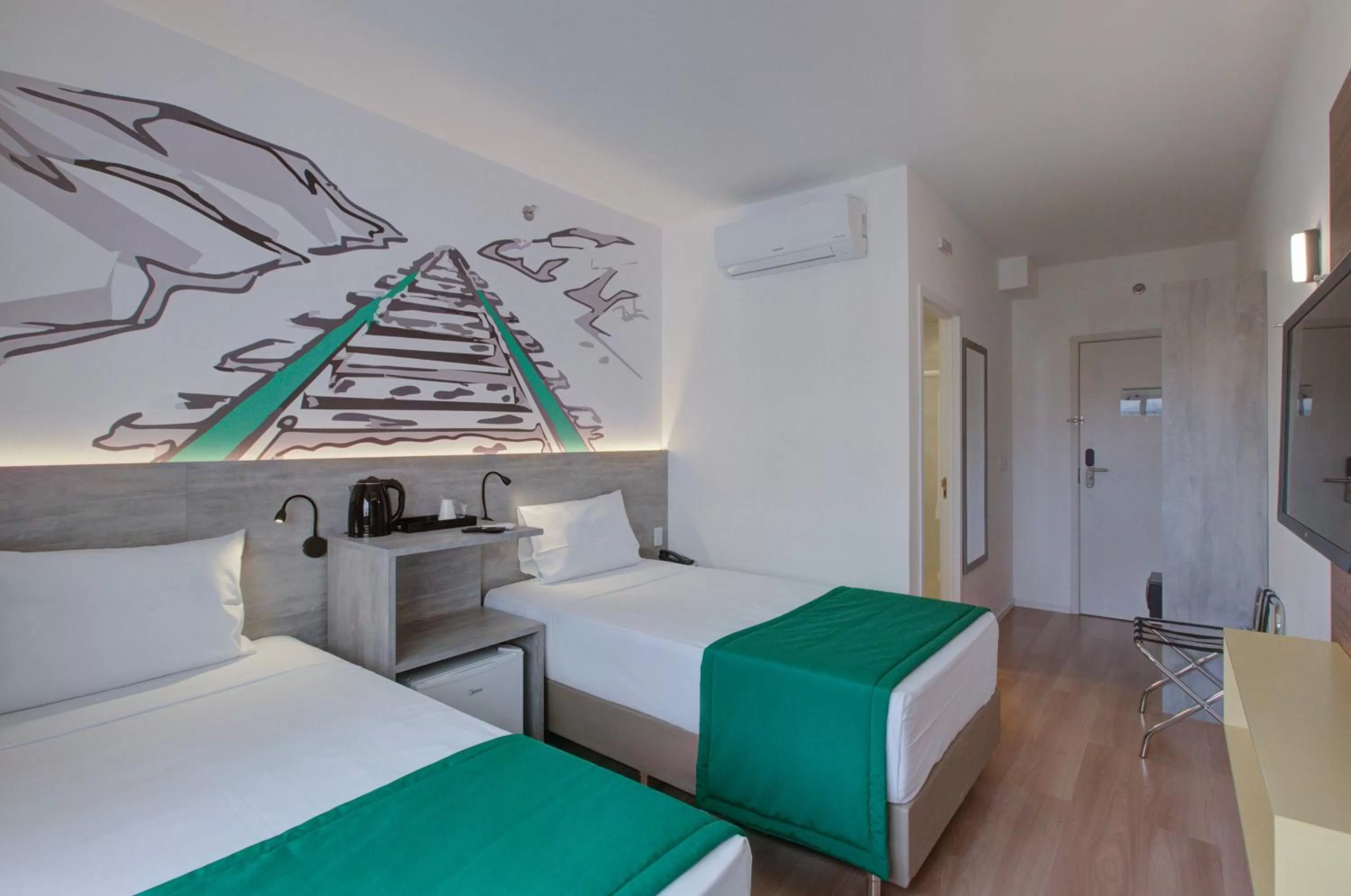 Photo of the whole room, Bed in Ramada Encore Cruzeiro