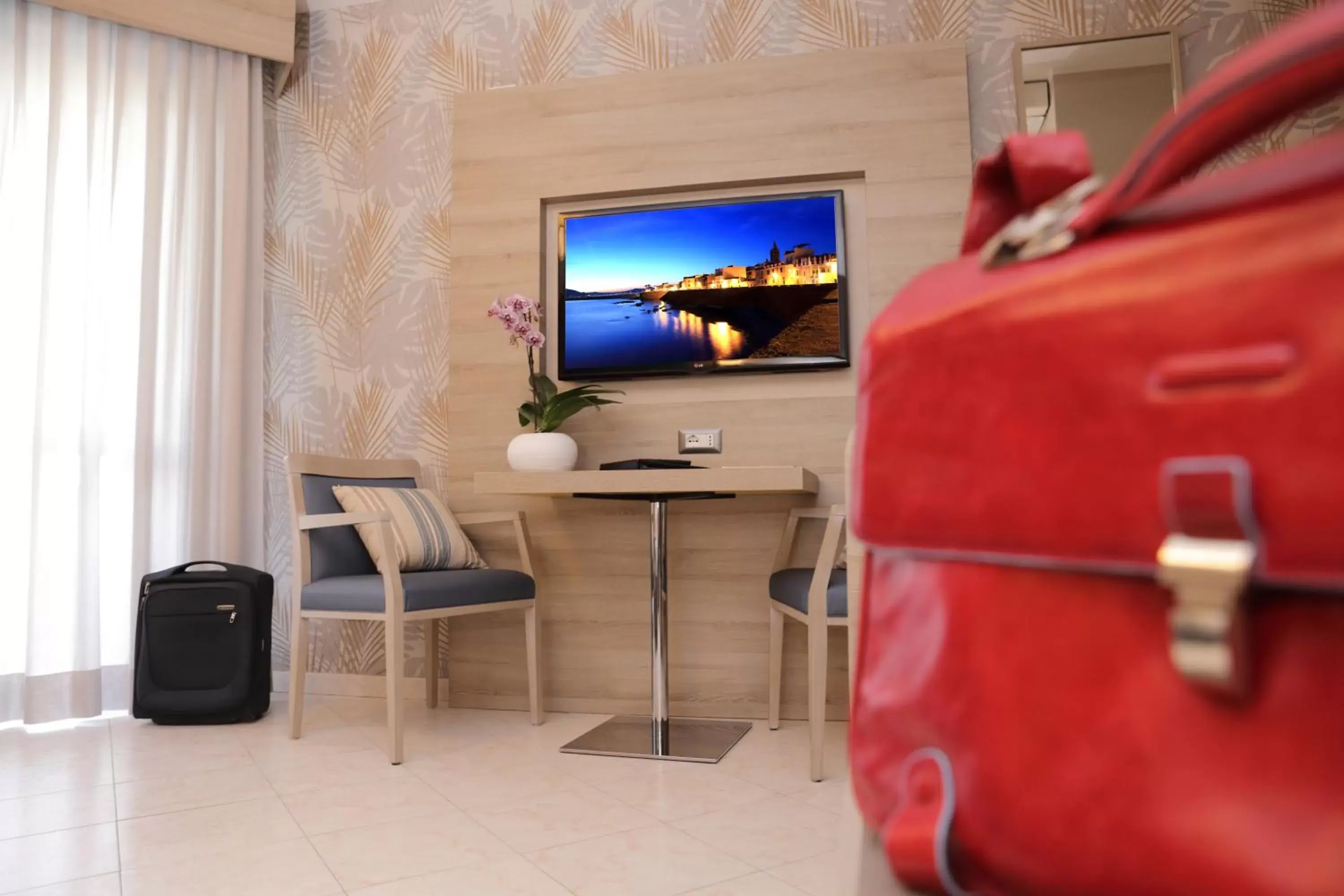 Bedroom, TV/Entertainment Center in Alma di Alghero Hotel