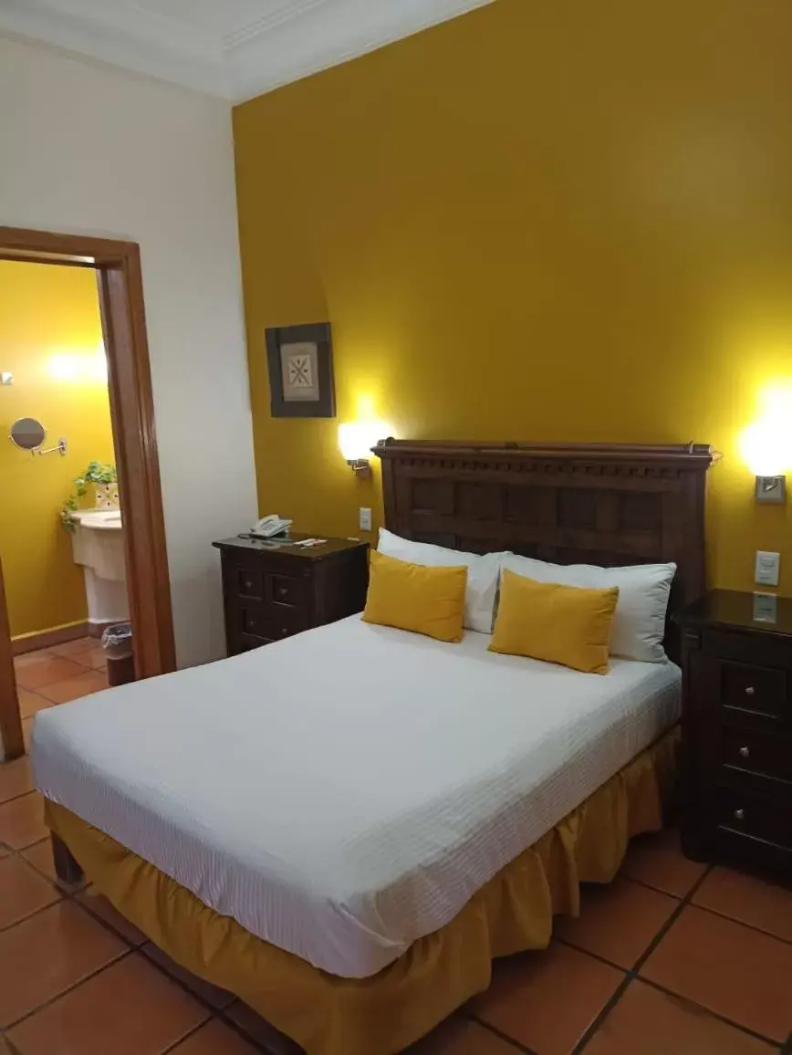 Bed in La Casa de los Patios Hotel & Spa