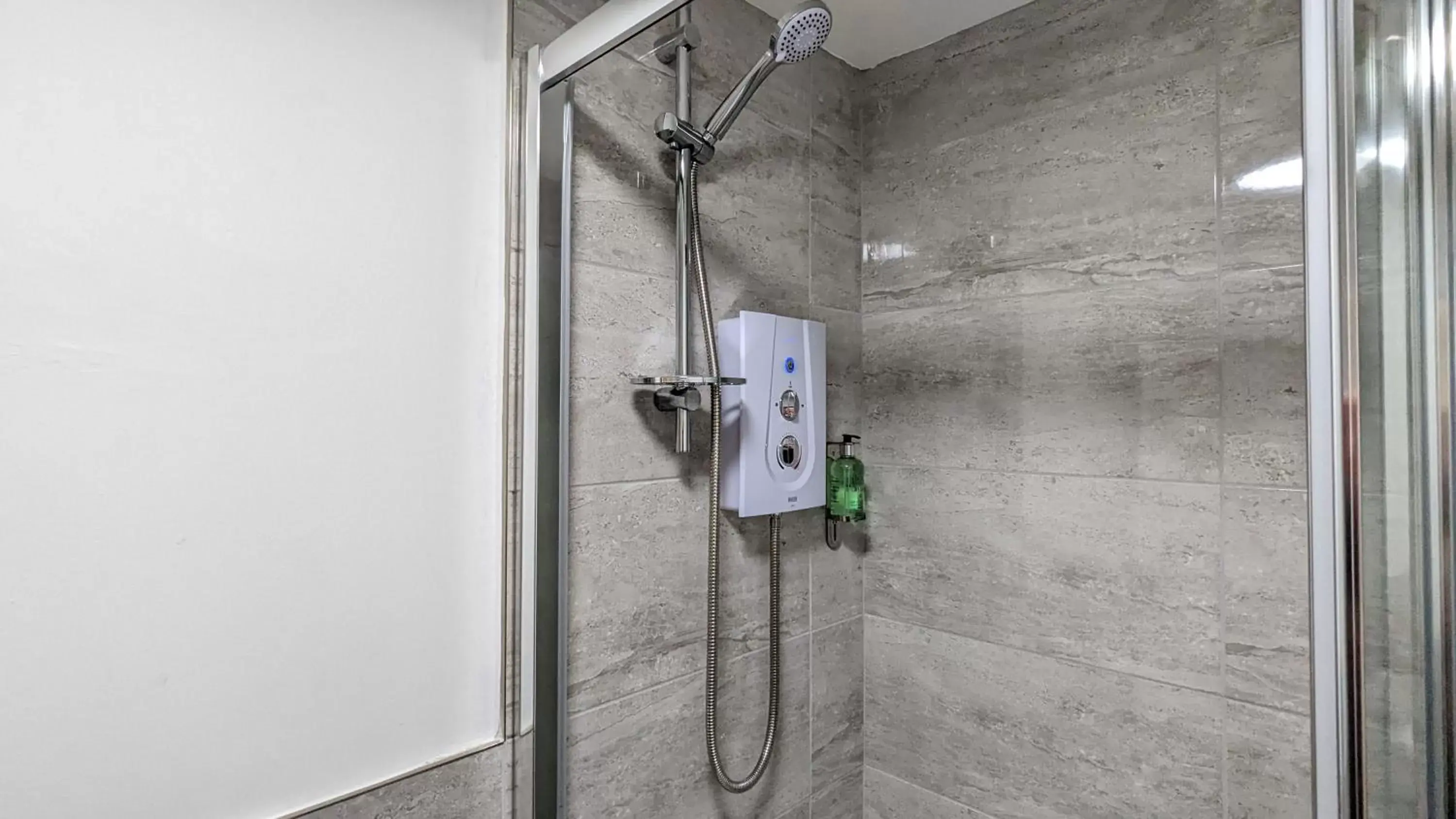 Shower, Bathroom in Cocoon @ International Inn + Apartments