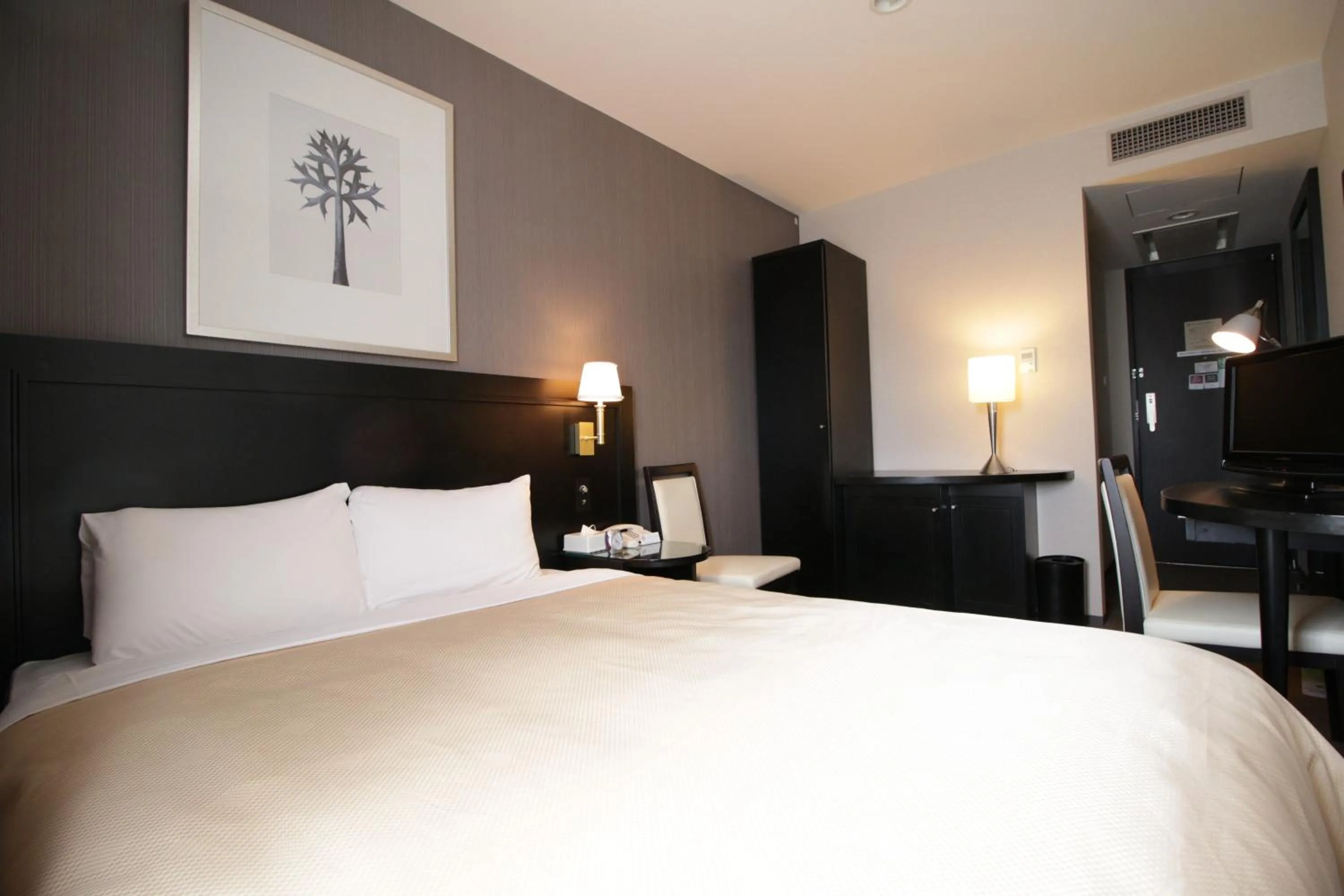 Photo of the whole room, Bed in Hotel Sunroute Ueda