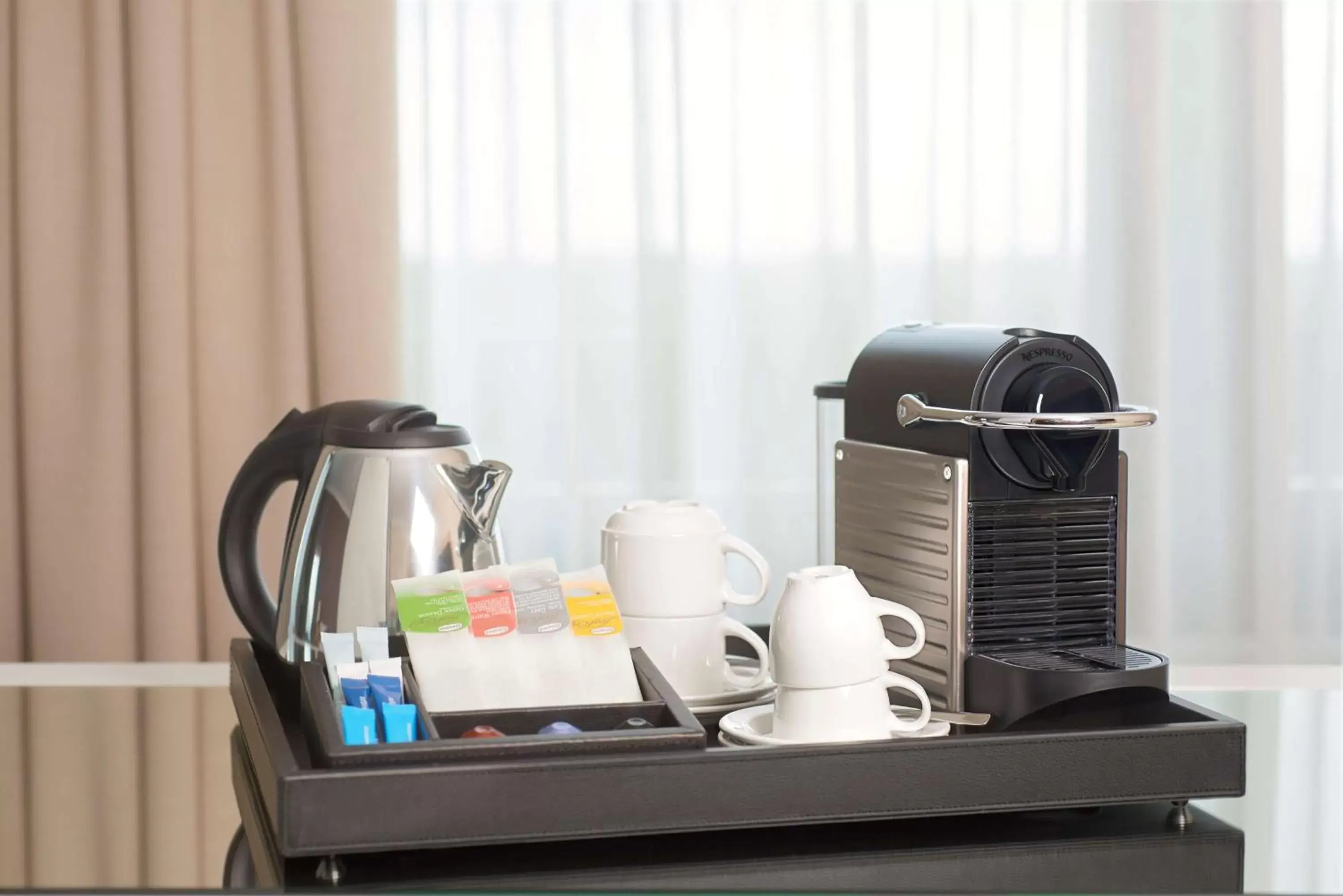 Coffee/tea facilities in NH Geneva Airport Hotel