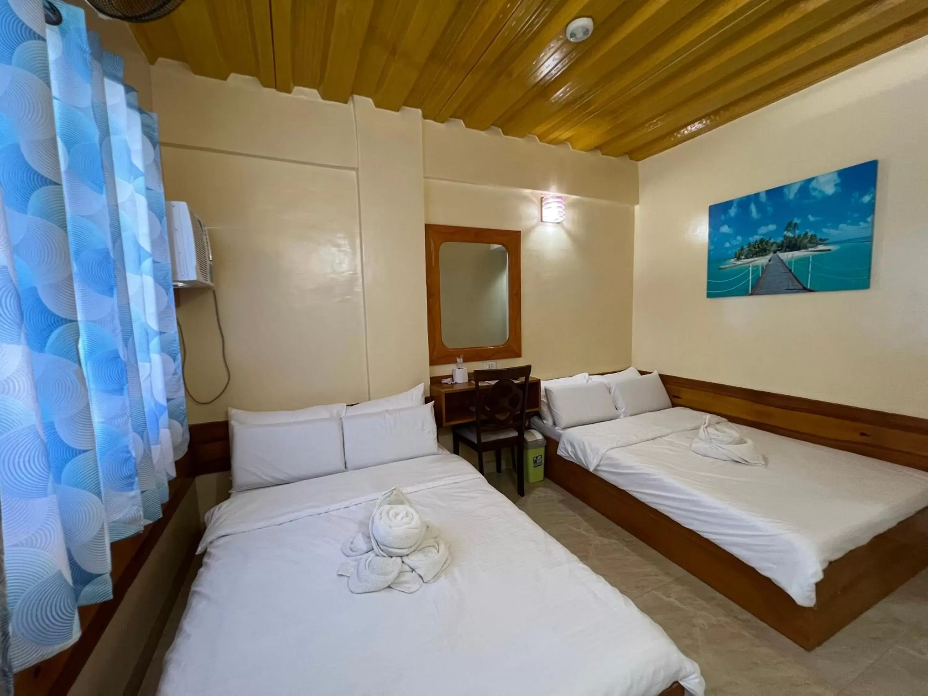 Bed in GingGing Hotel And Resort Bed in GingGing Hotel And Resort