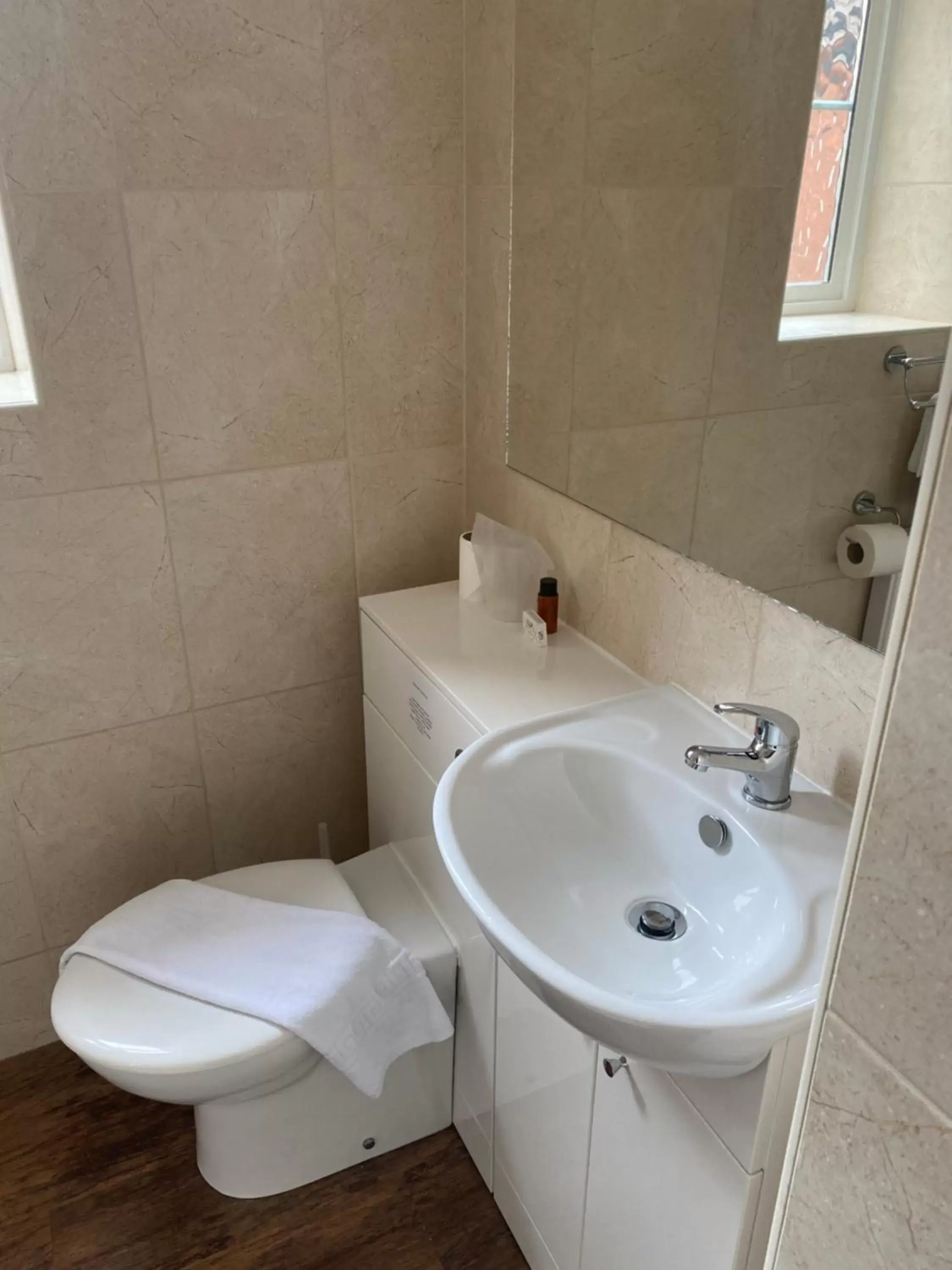 Toilet, Bathroom in The Tudor Hotel