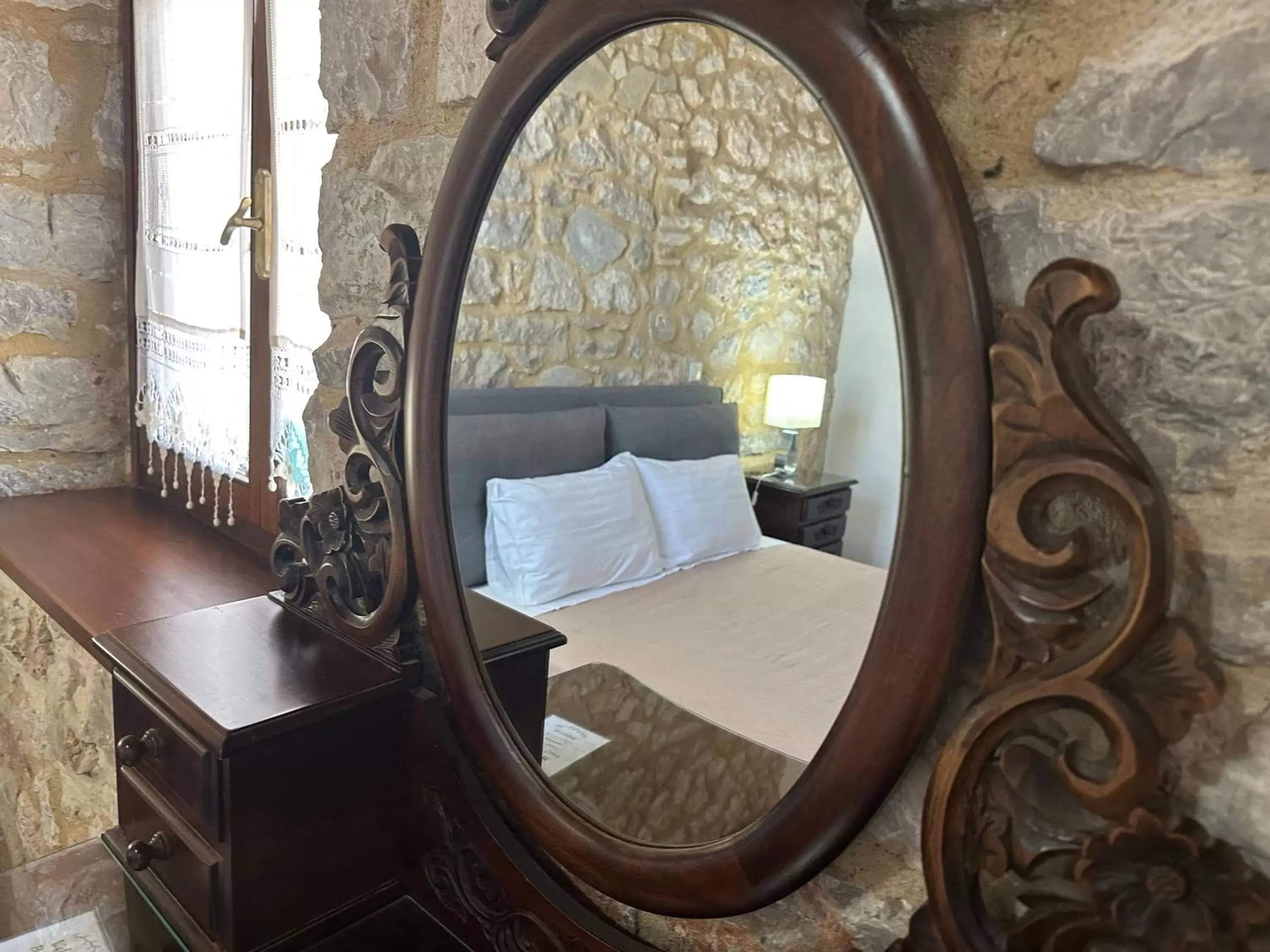 Bed in SeaFront Stone Suites