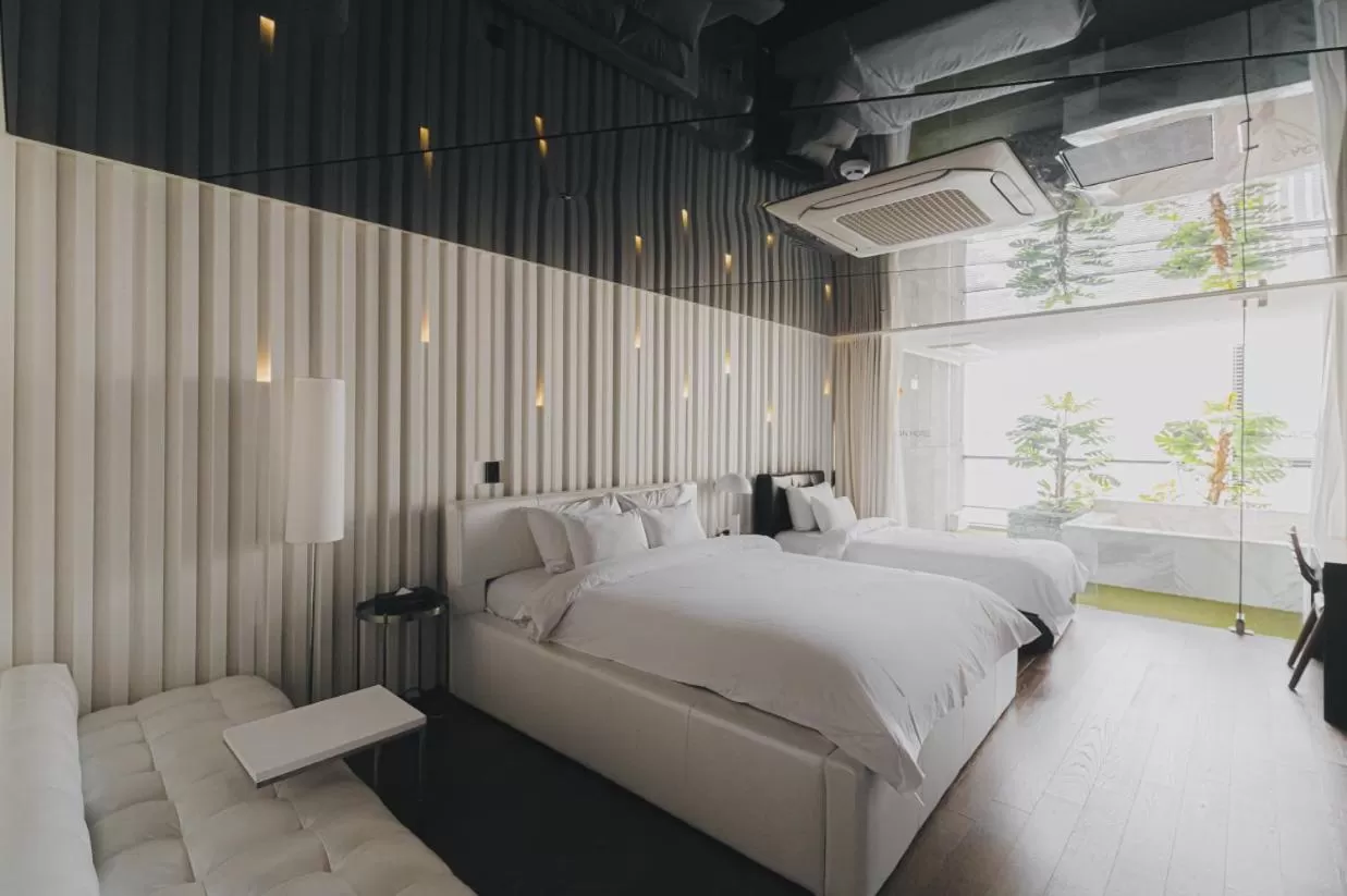Bed in ACC Design Hotel