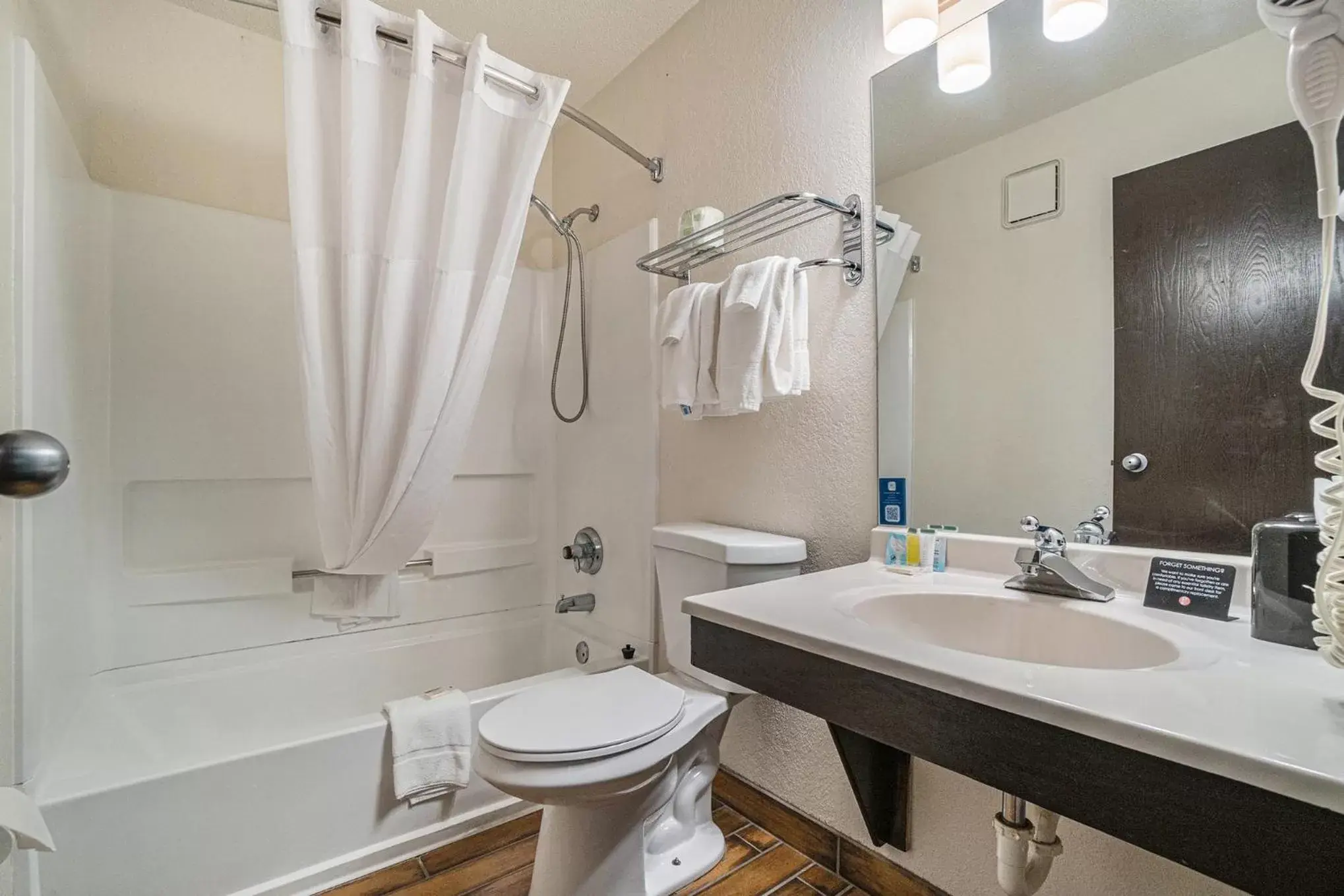 Bathroom in Days Inn & Suites by Wyndham Traverse City