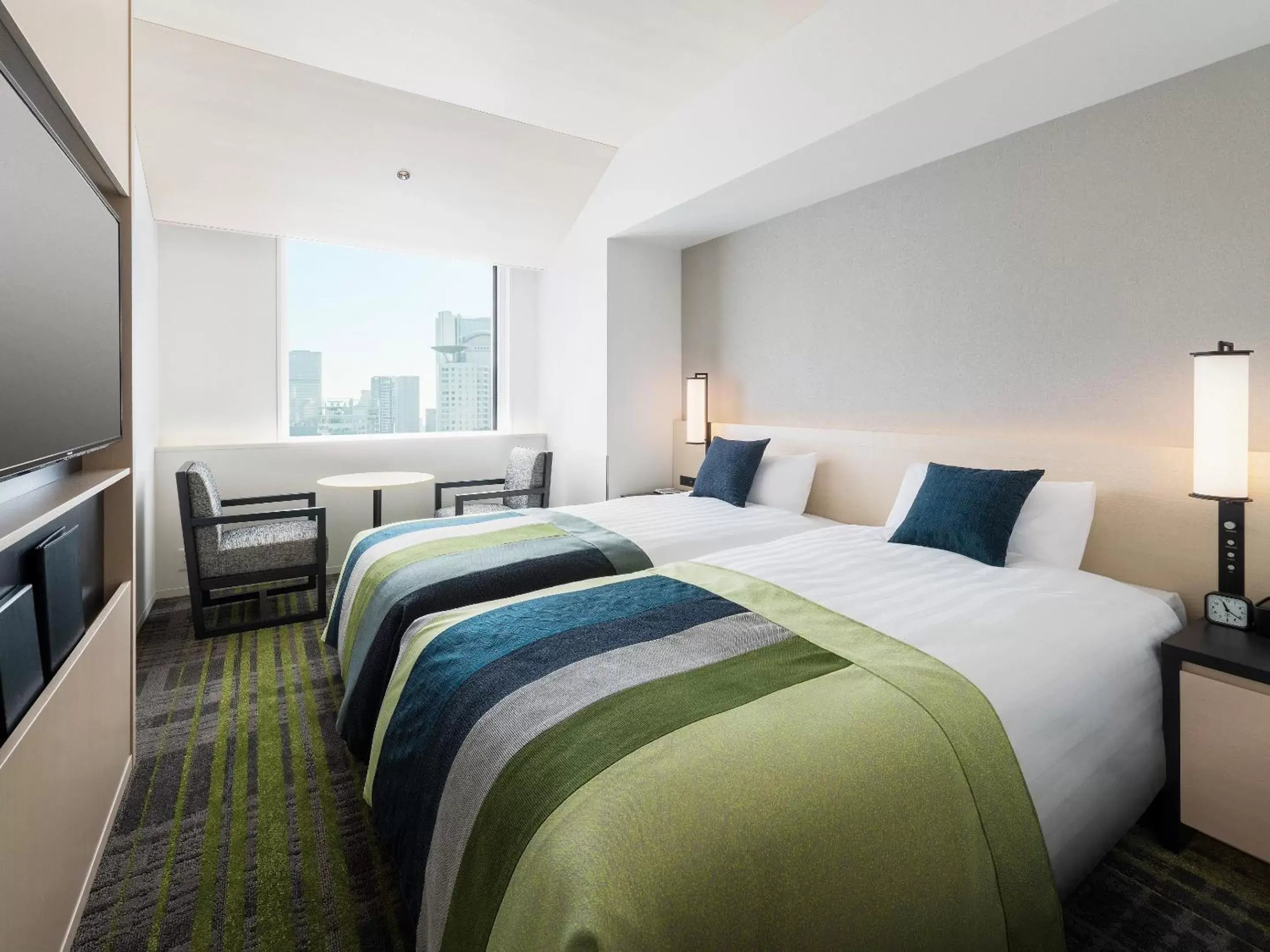 Bed in Hotel Hankyu RESPIRE OSAKA