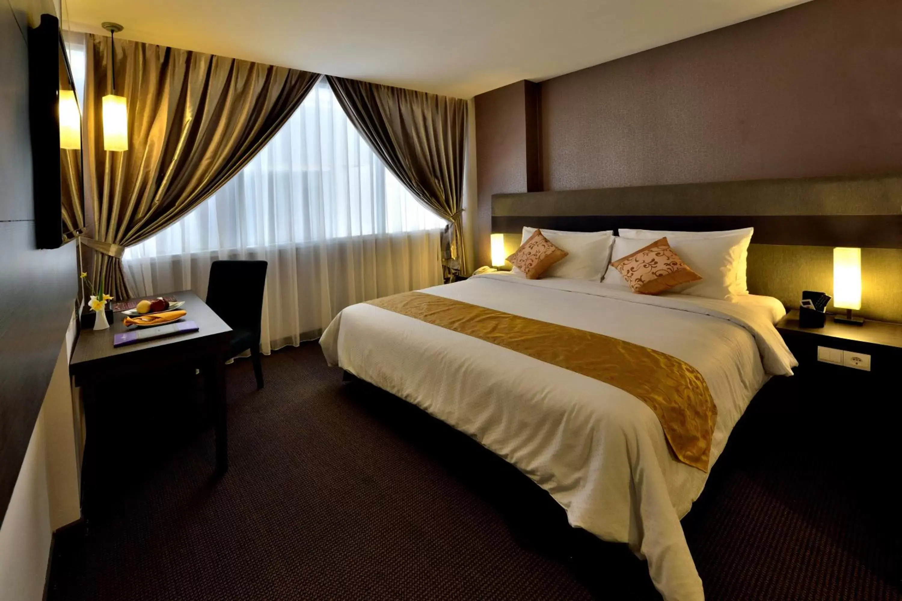 Bedroom, Bed in Tjokro Hotel Pekanbaru
