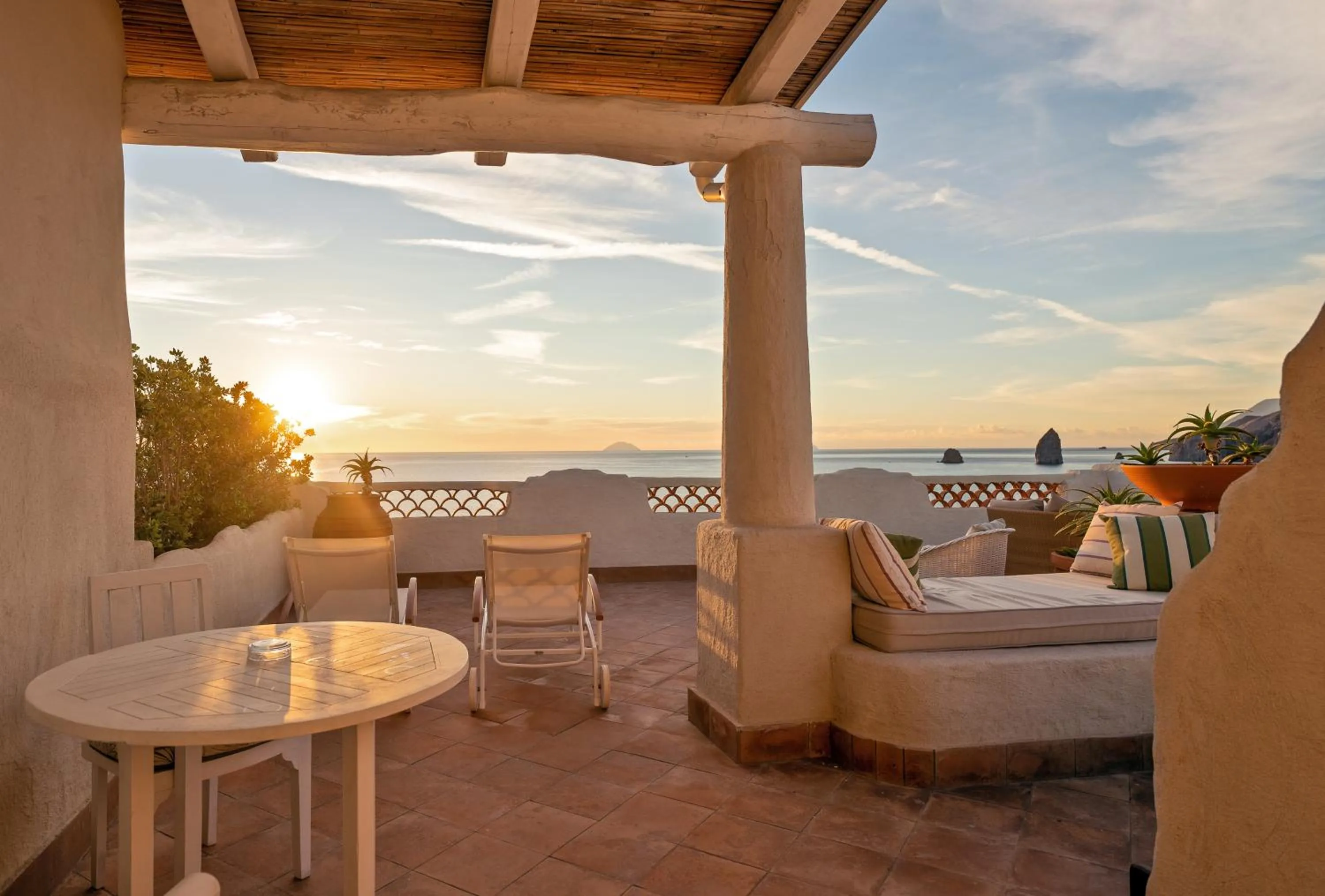 Patio in Therasia Resort Sea and SPA - The Leading Hotels of the World