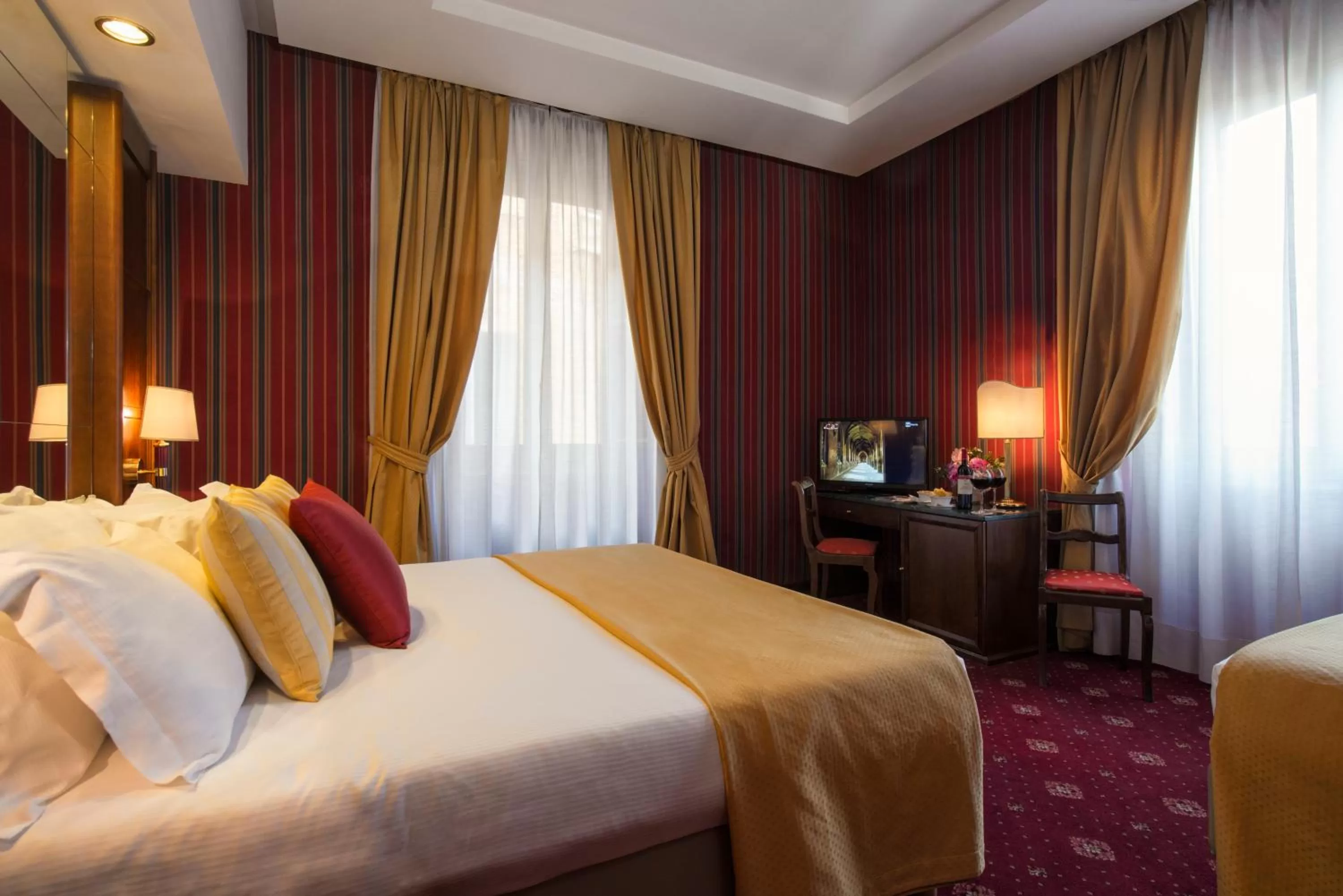 Bed in Atlante Garden Hotel