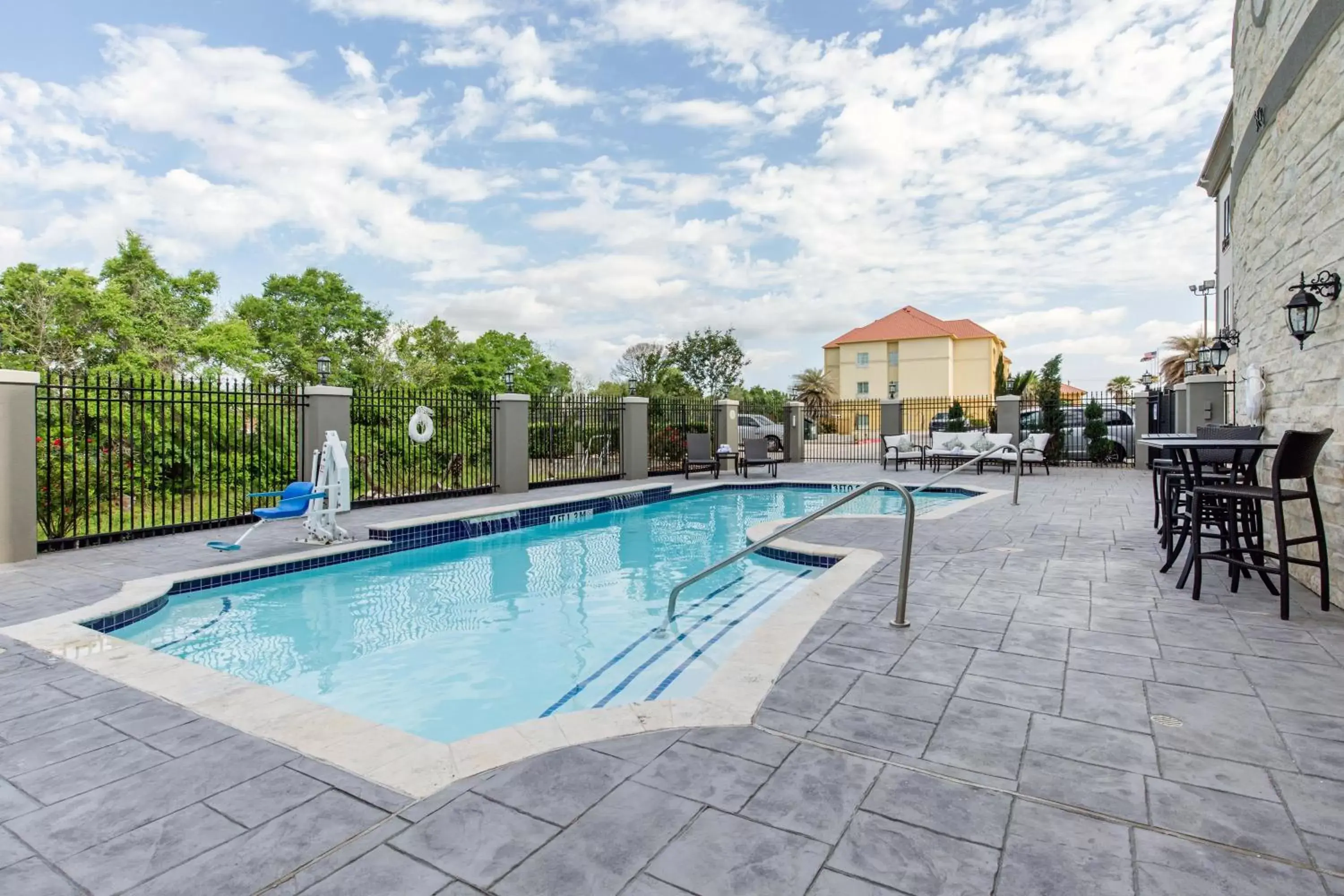 Swimming Pool in Holiday Inn Express Houston-Alvin, an IHG Hotel