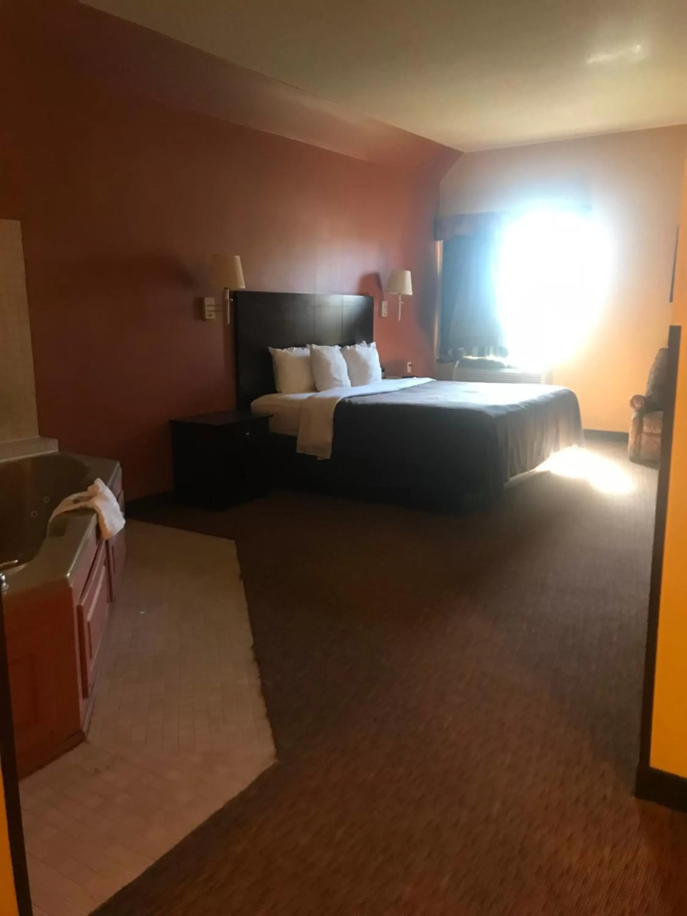 Bed in Shary Inn and Suites