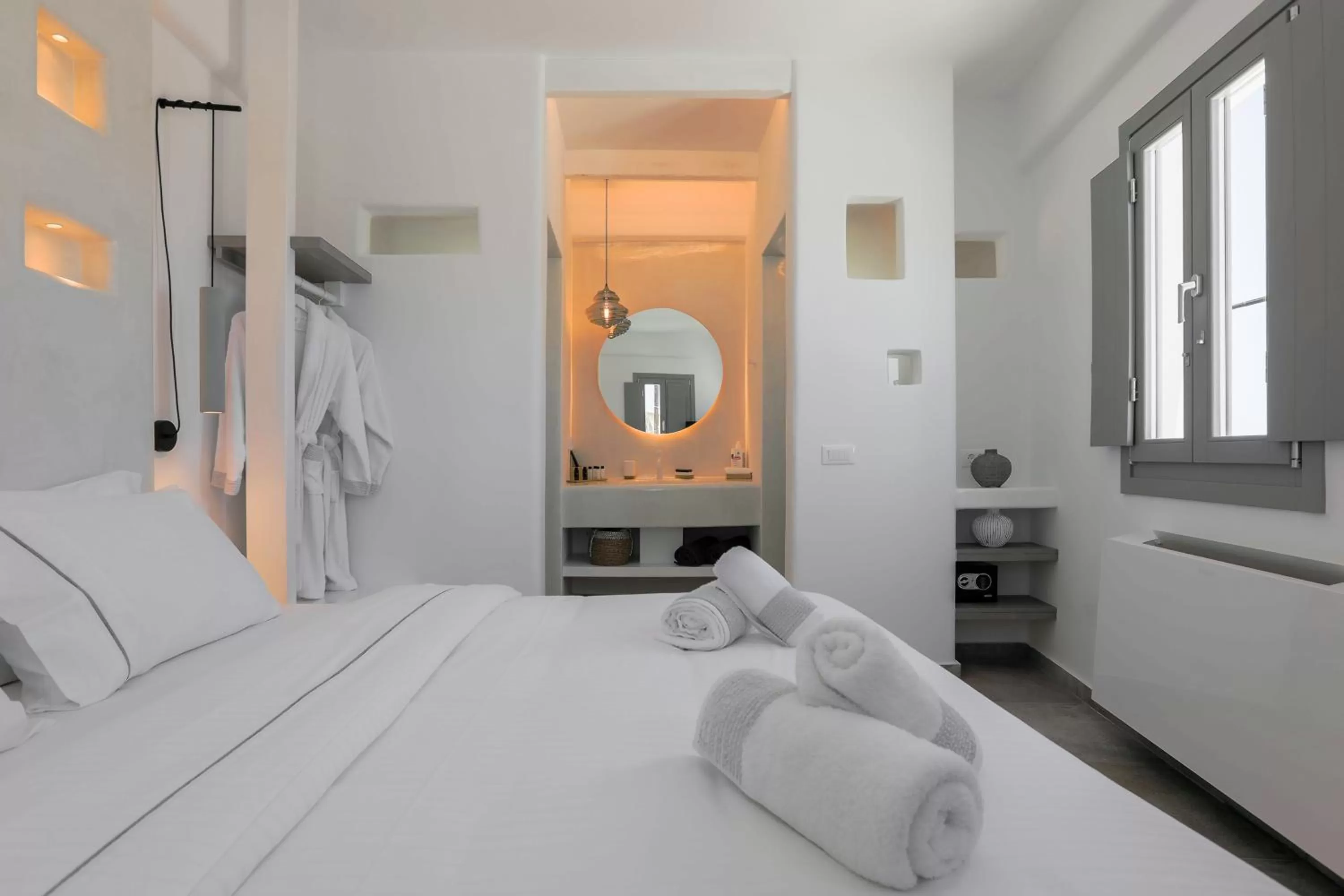 Photo of the whole room, Bed in Eternity Suites Santorini