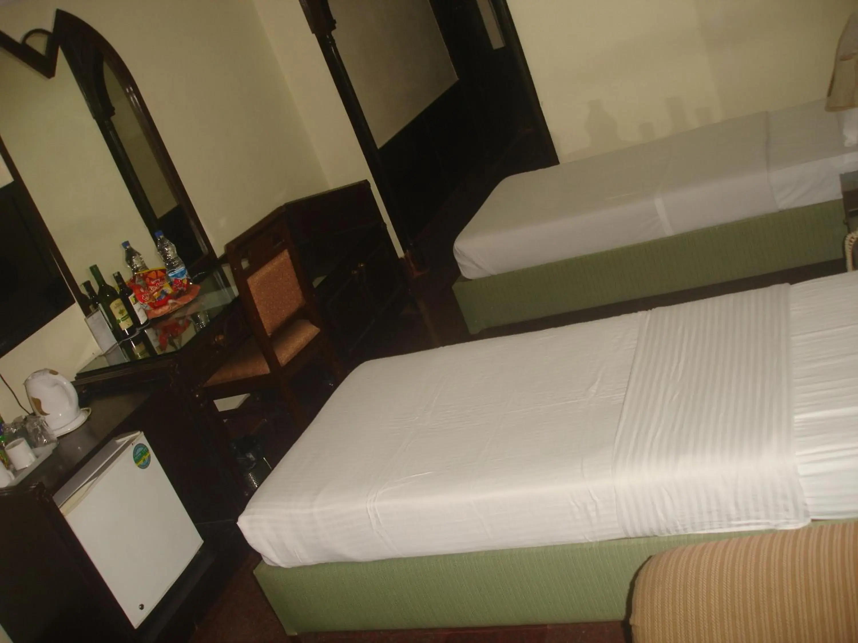 Bed in Empires Hotel