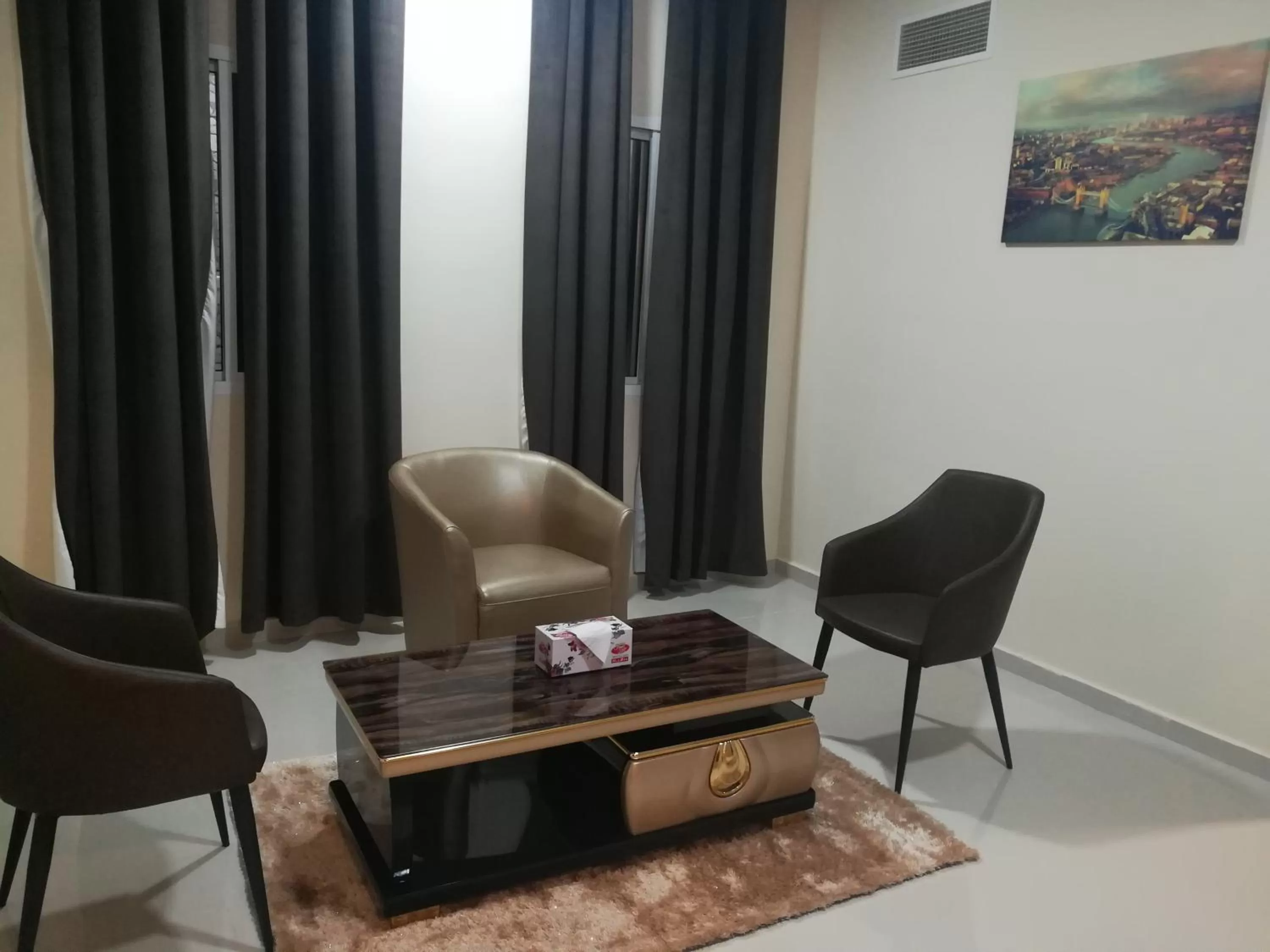 Living room in Tanuf Residency Hotel