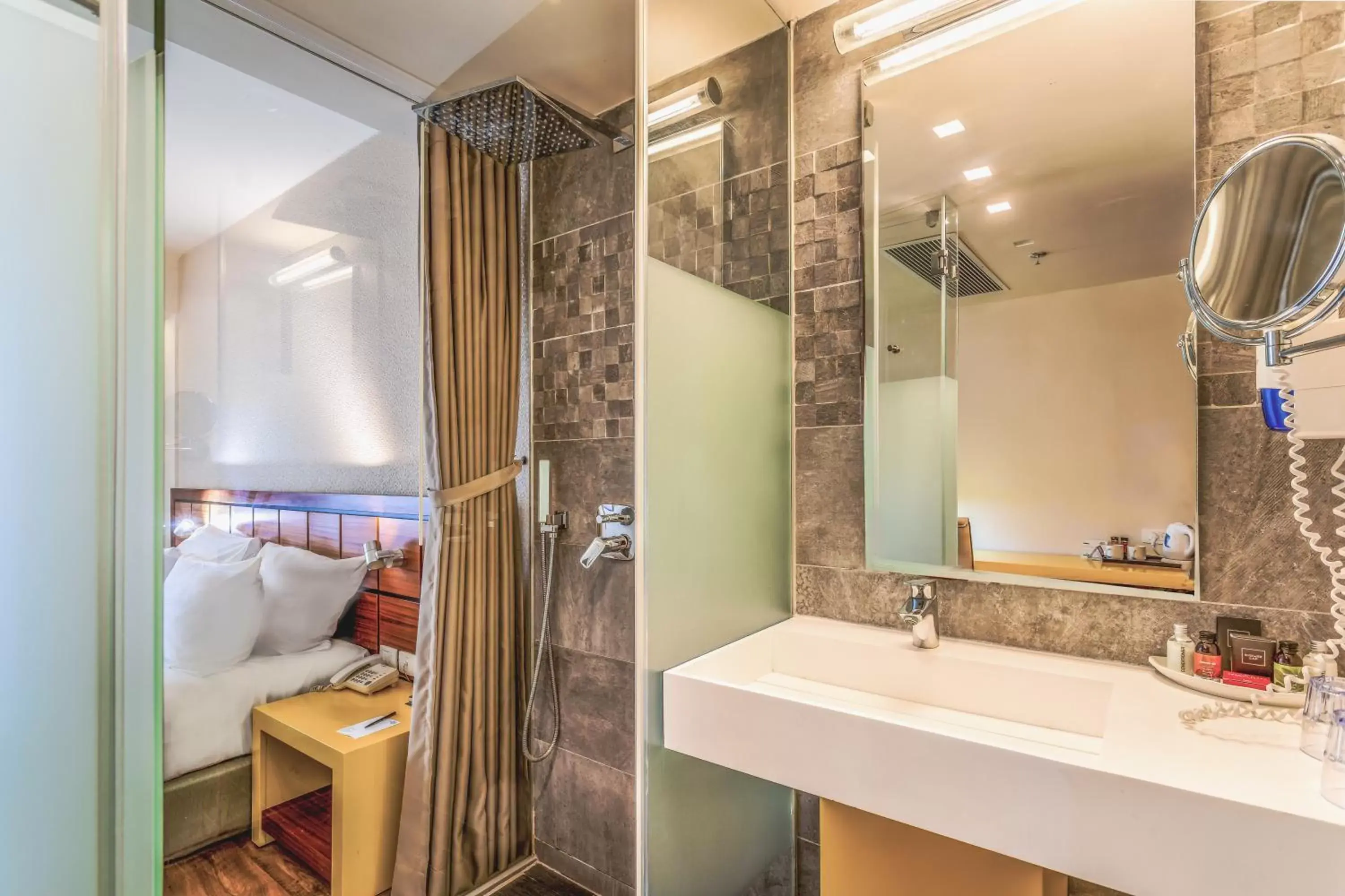 Bathroom in Haifa Bay View Hotel By AFI Hotels