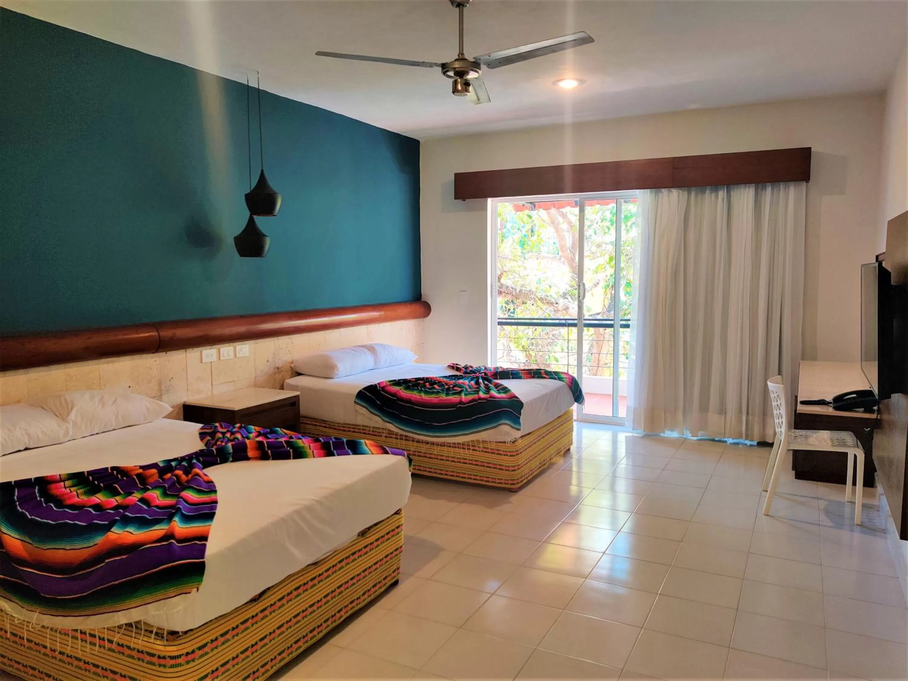 Photo of the whole room, Bed in Hotel Mariachi by Kavia 5th Av