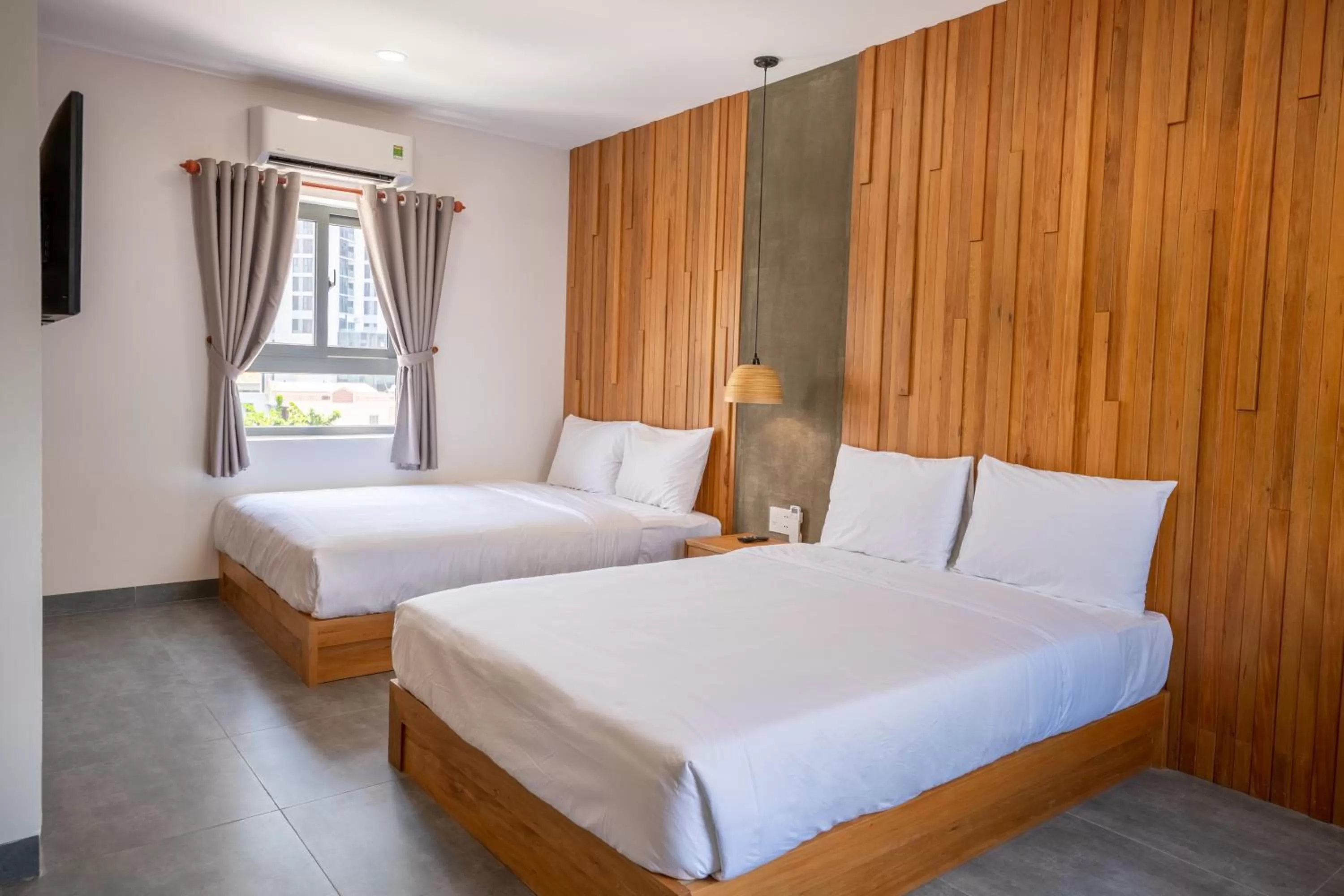 Bed in Coast House Boutique Hotel