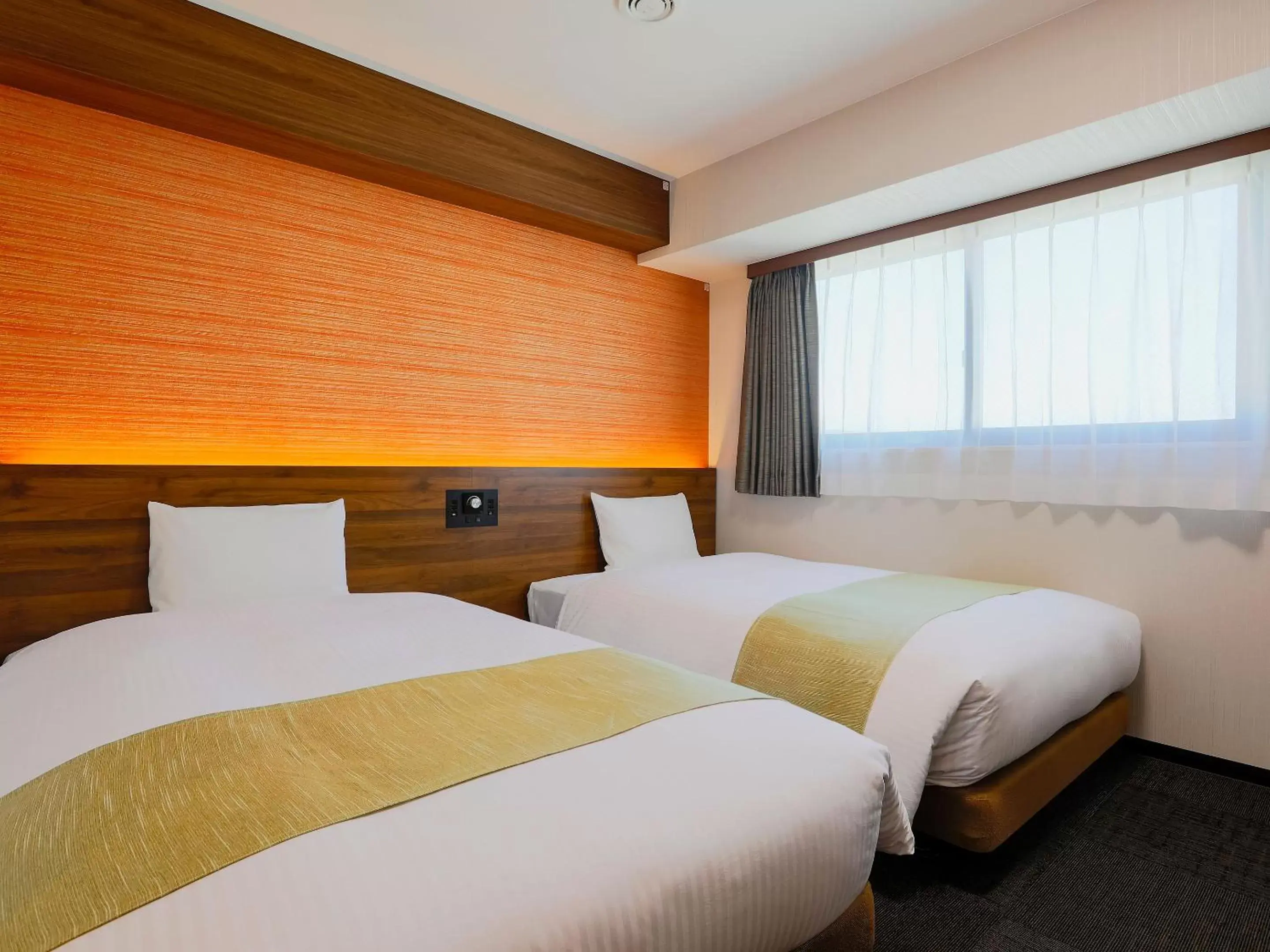 Bed in Hotel Wing International Takamatsu