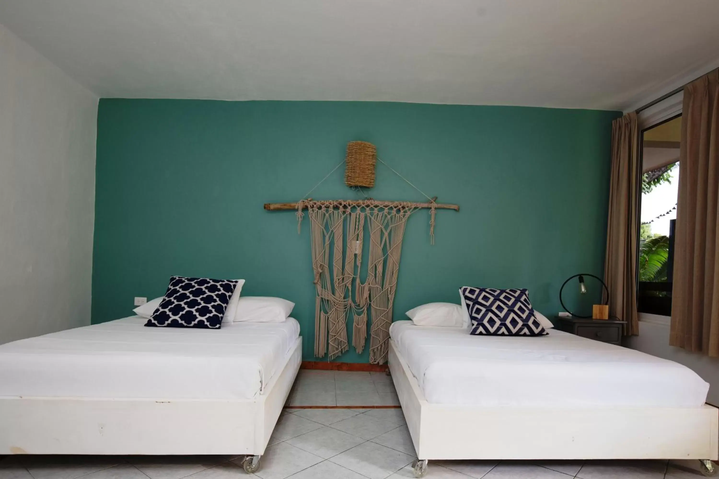 Bed in Casa Colonial Tulum