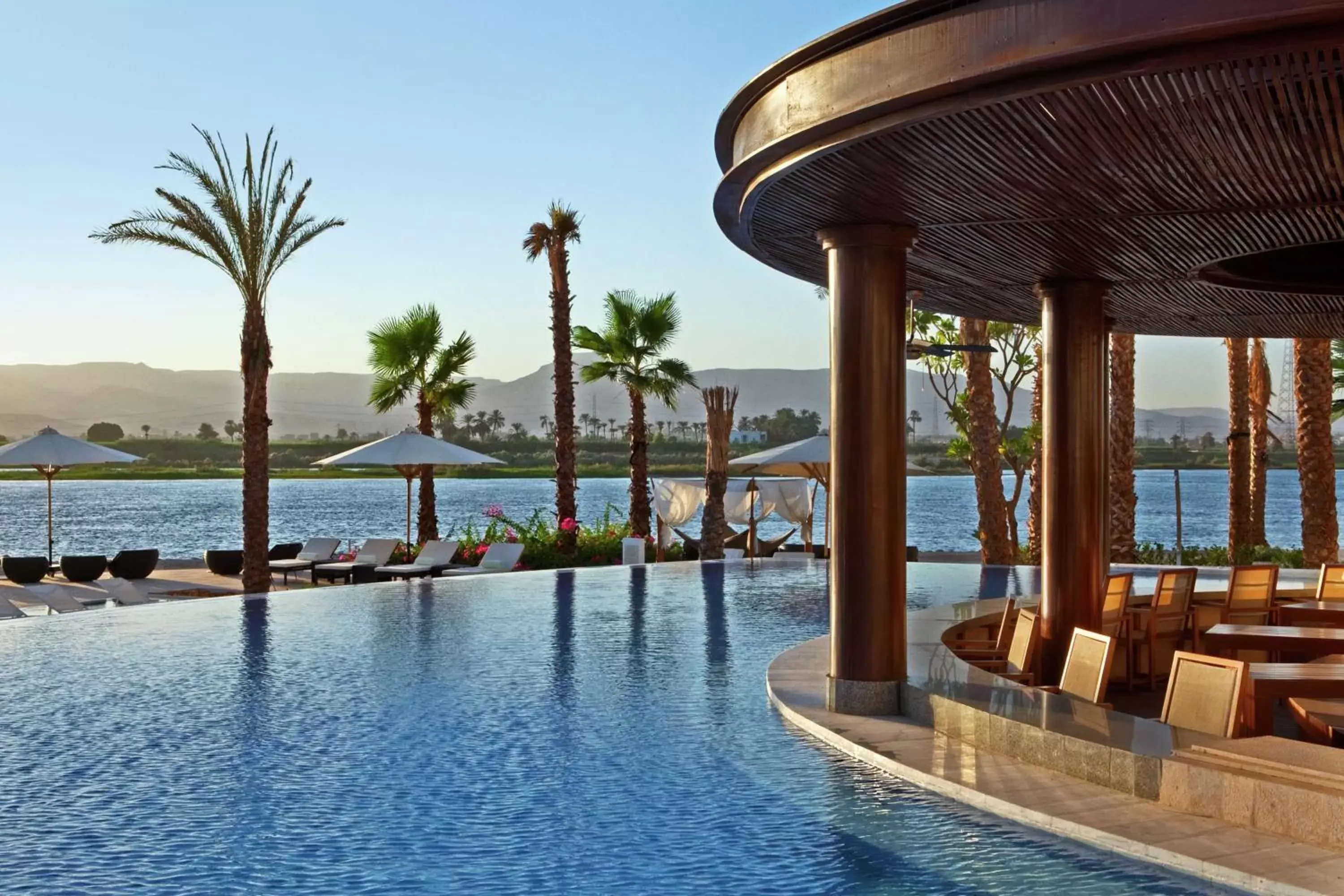 Lounge or bar, Swimming Pool in Hilton Luxor Resort & Spa