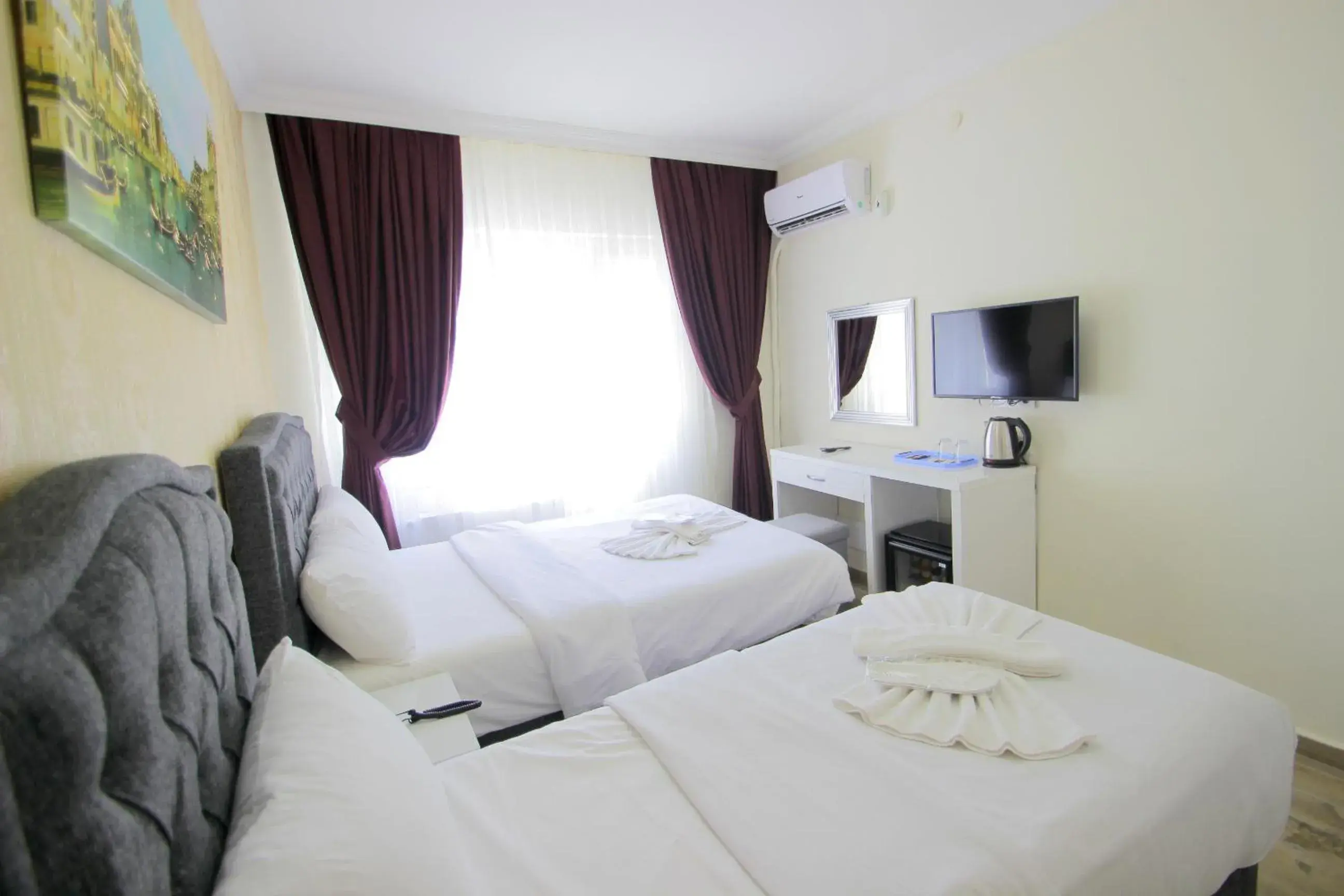 Photo of the whole room, Bed in Grand FM Hotel