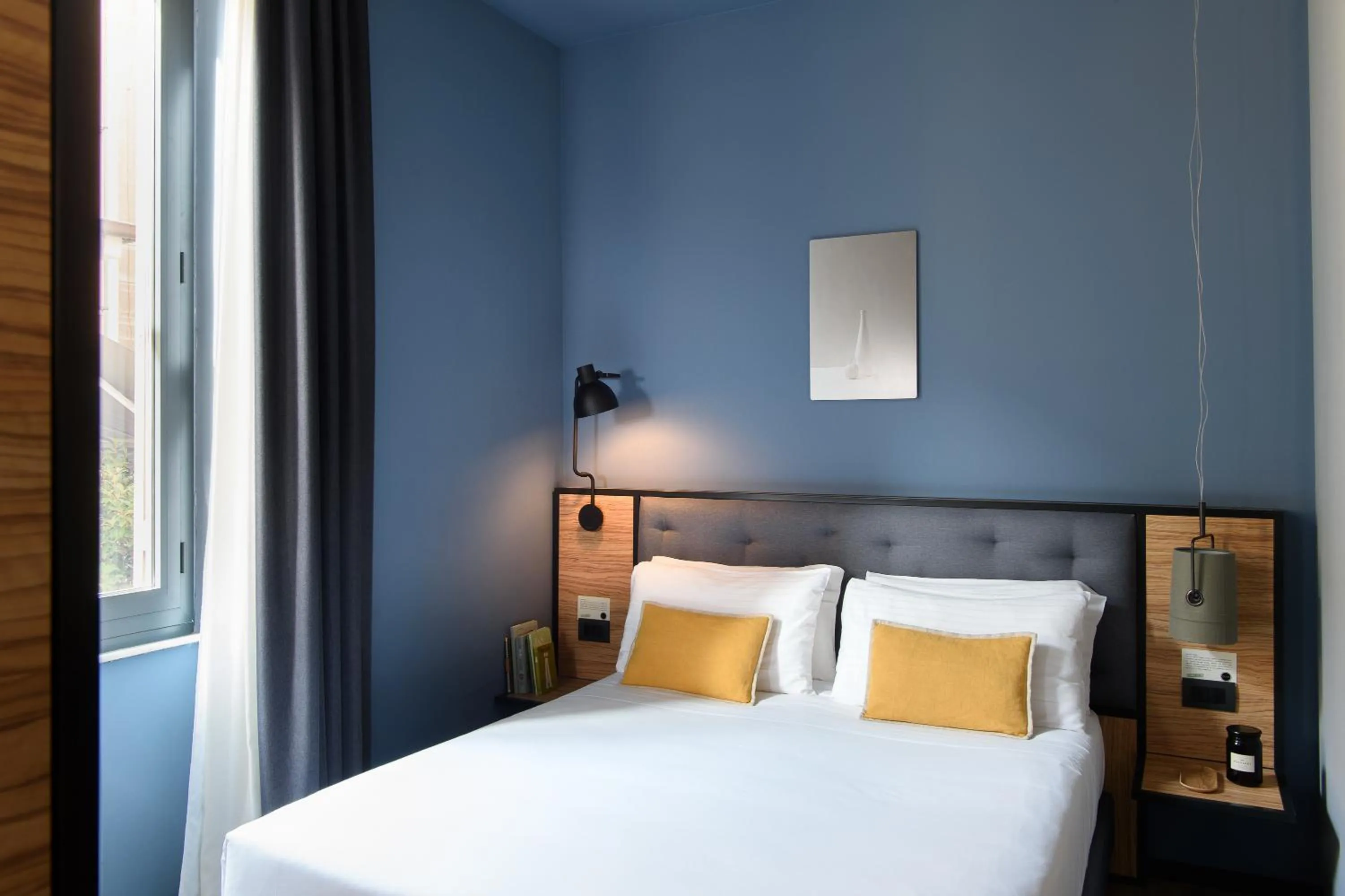 Bed in The Poet Hotel