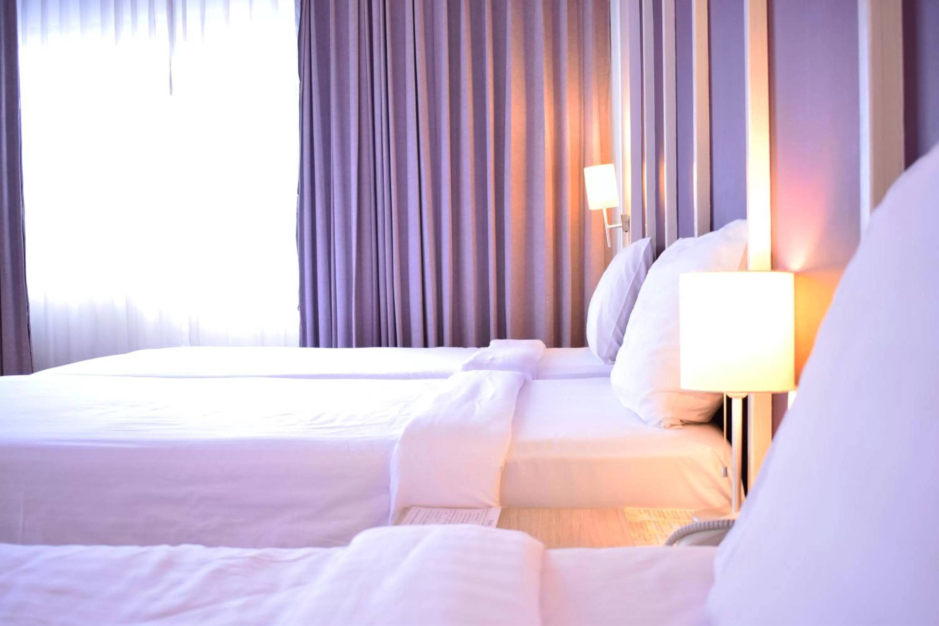 Bed in Trang Hotel Bangkok - SHA Plus