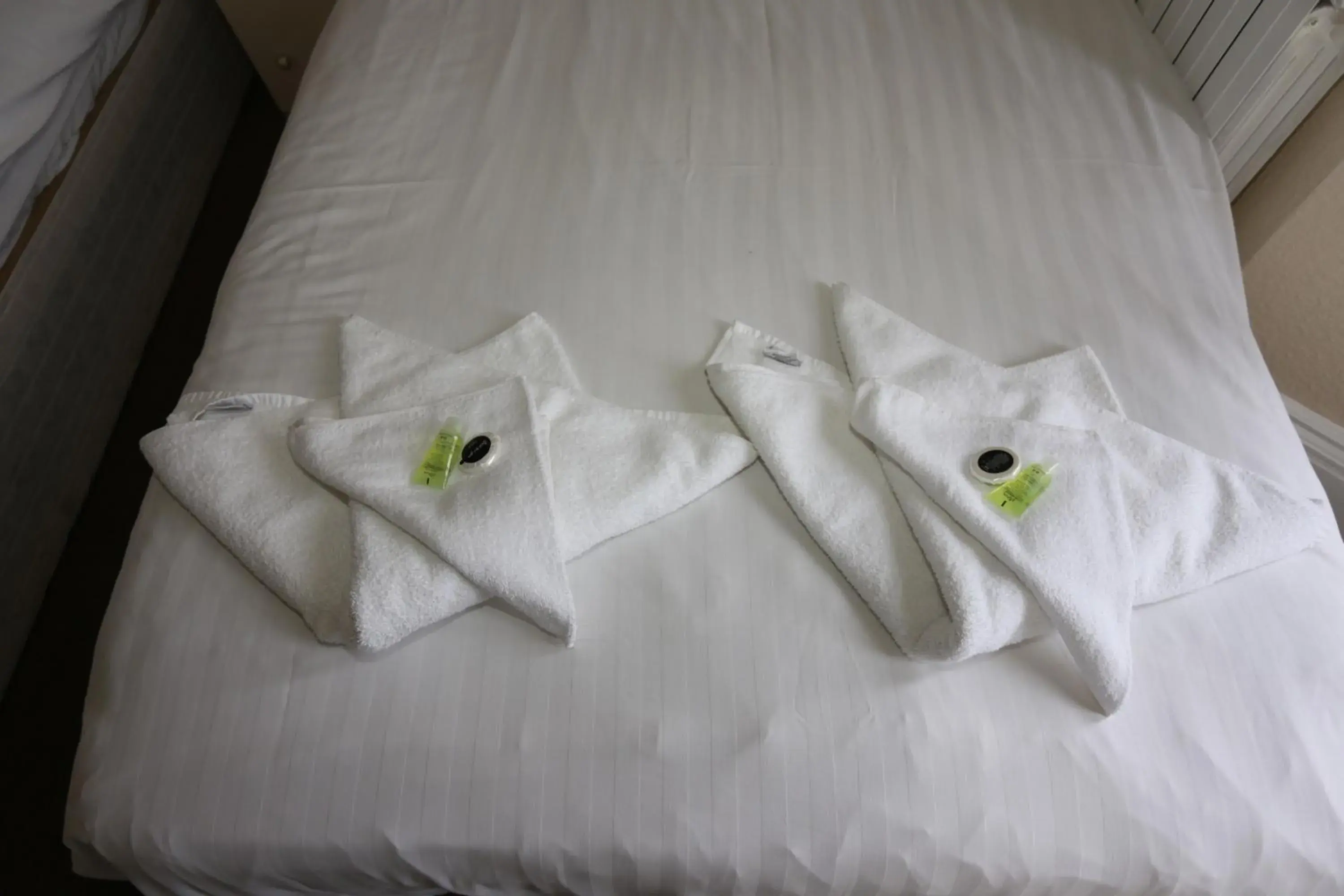 towels, Bed in Charlie Hotel