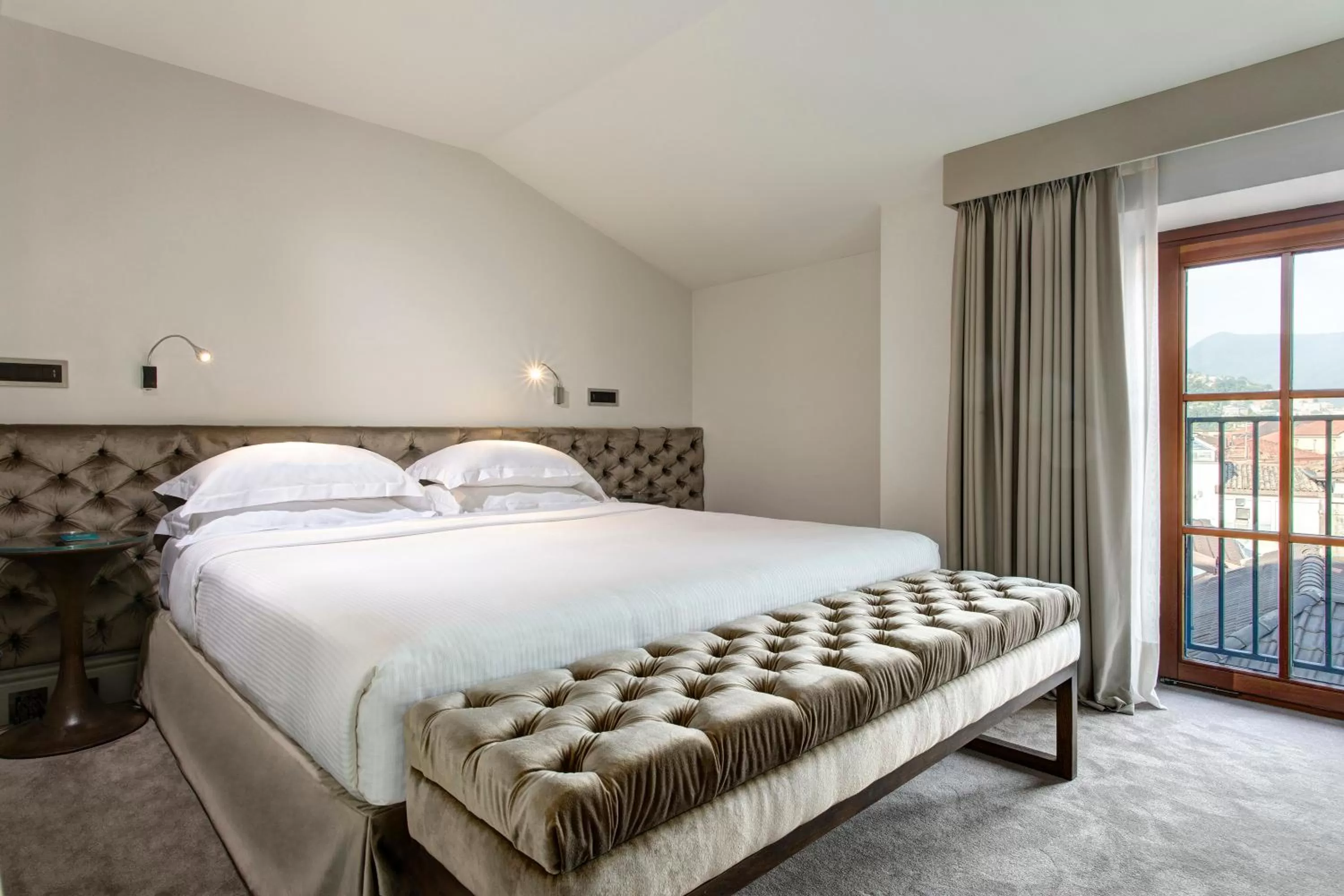 Bed in LUGANODANTE Boutique & Lifestyle Hotel
