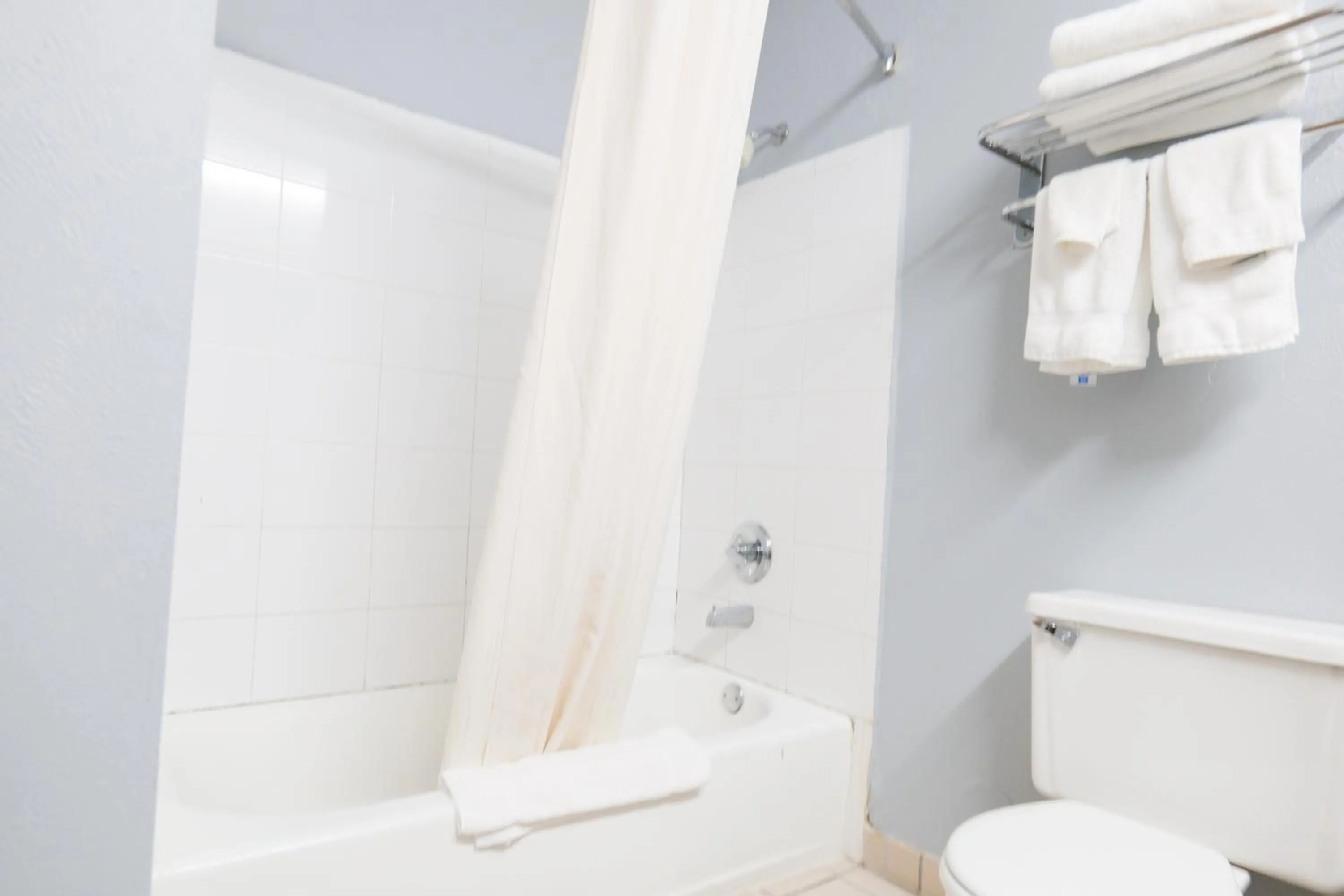 Shower in Baymont by Wyndham Flint Airport North