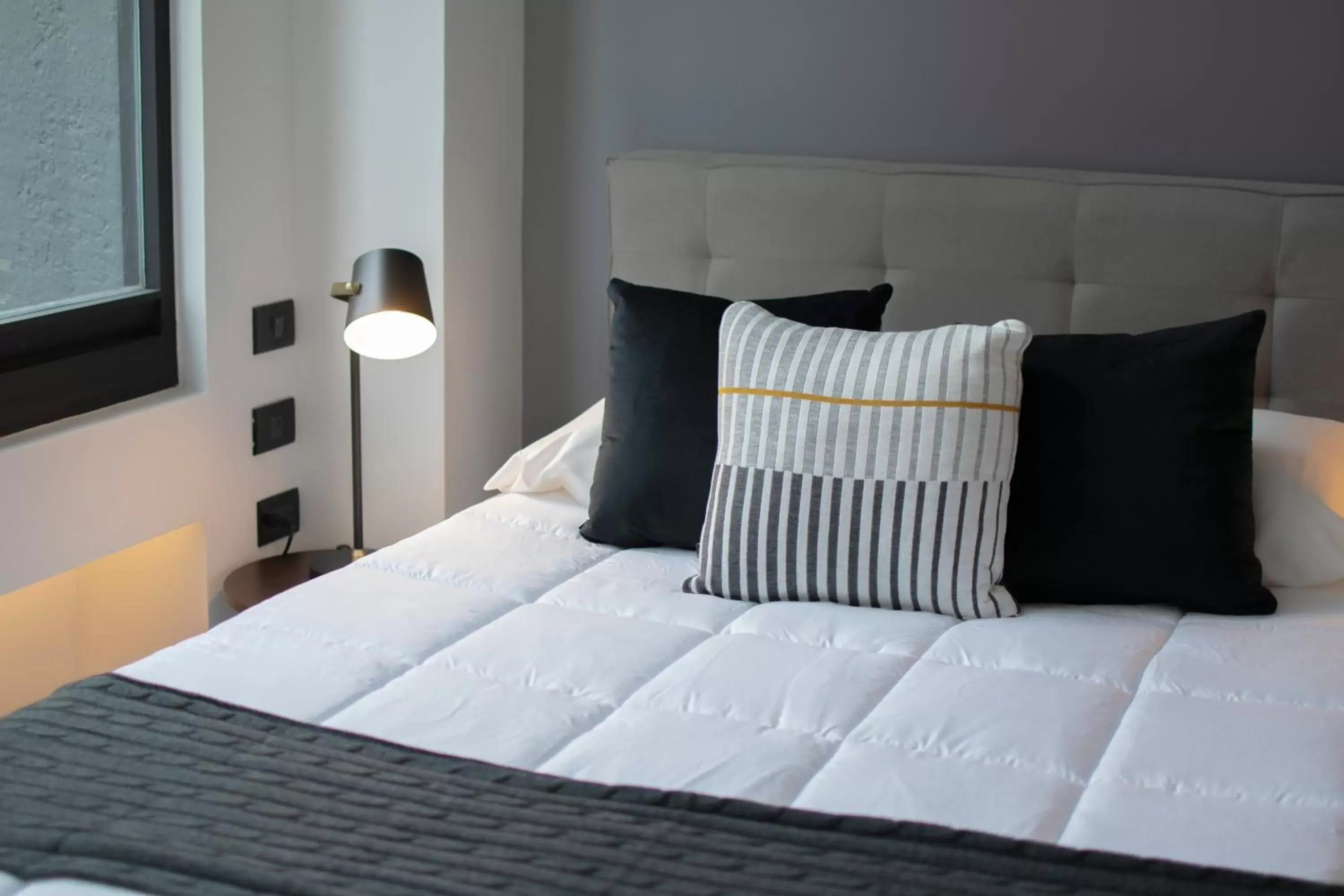 Bed in Punto Lofts