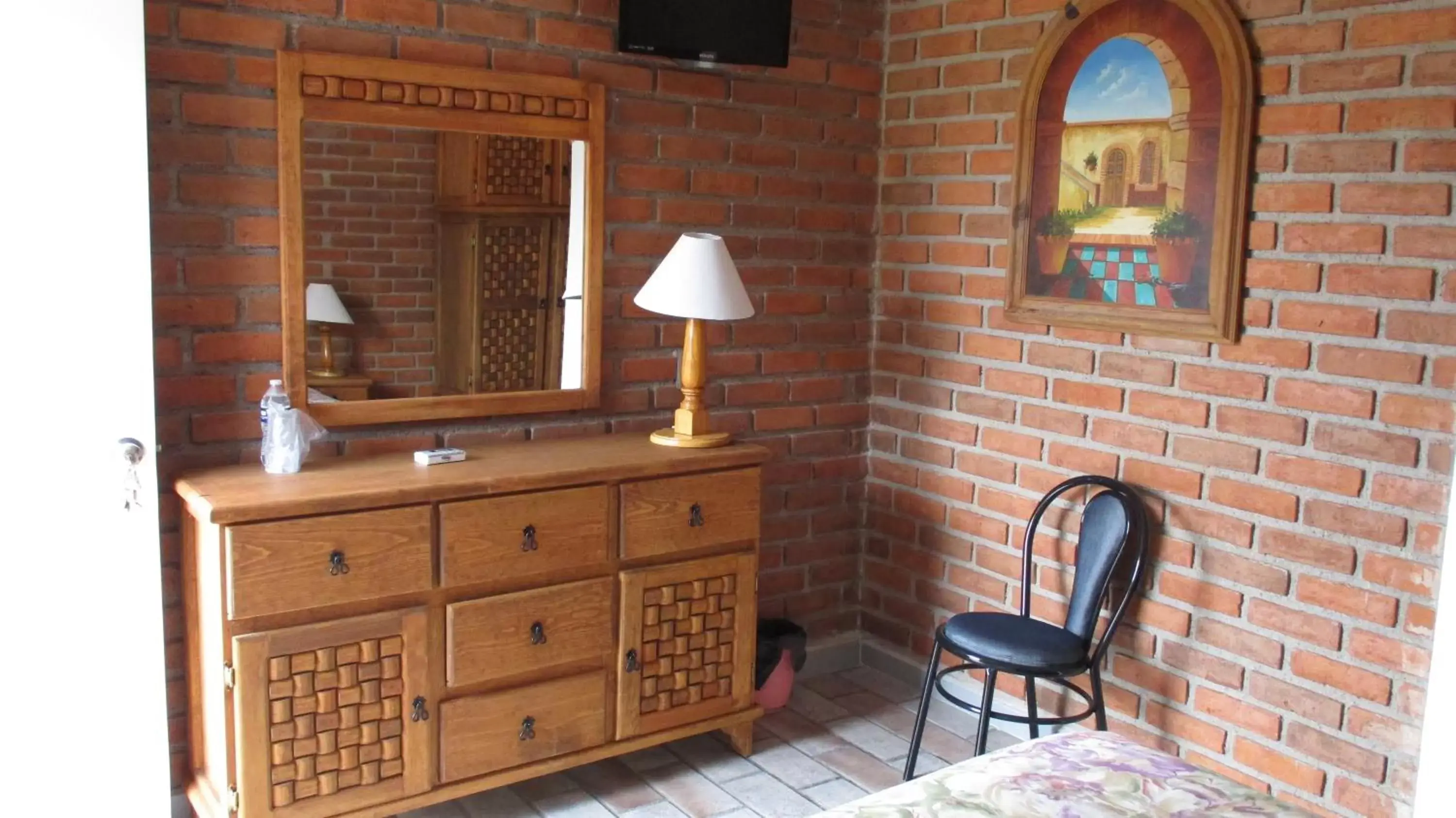 Bedroom in Hotel Villa Monarca Inn