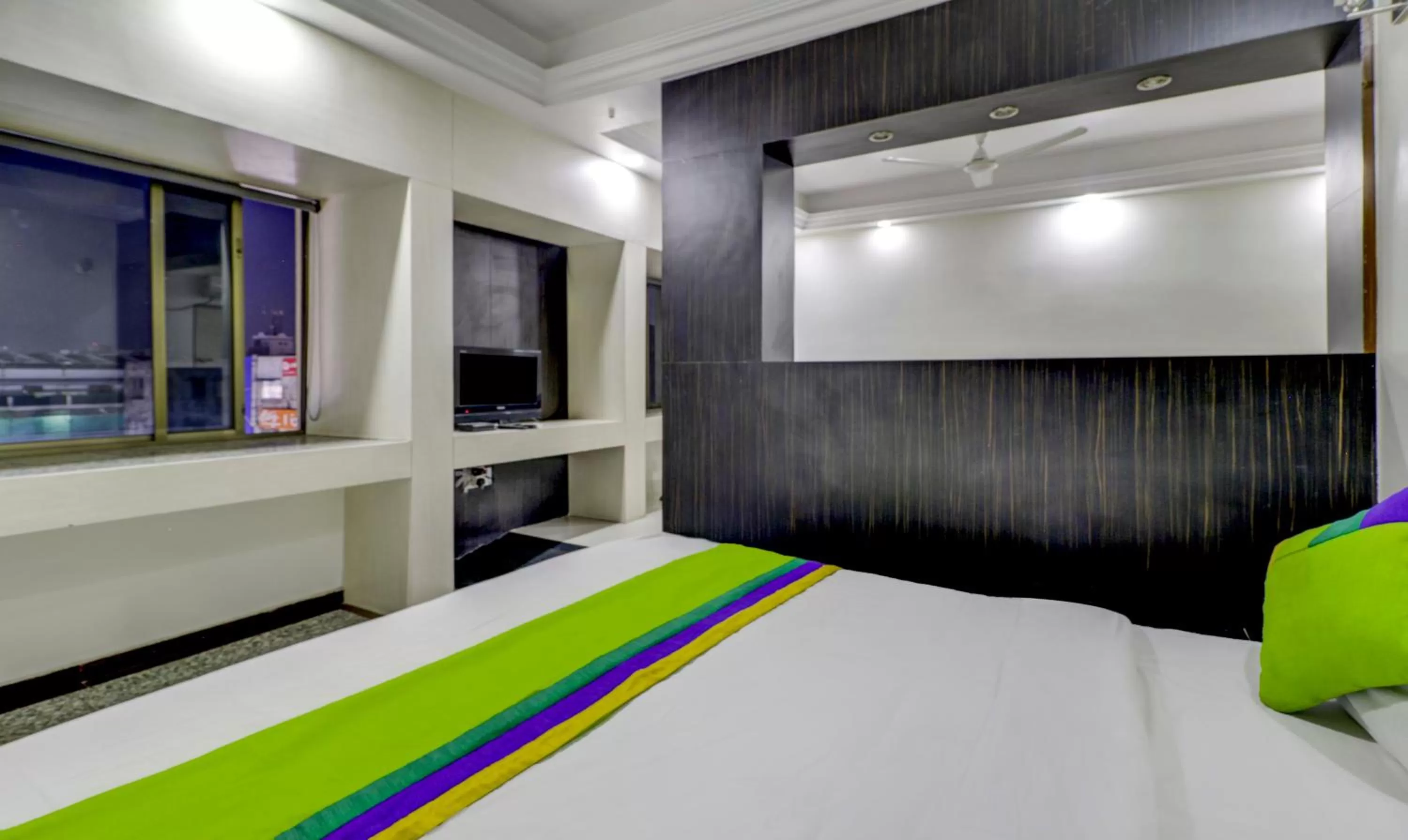 Bed in Treebo Trend Orange City