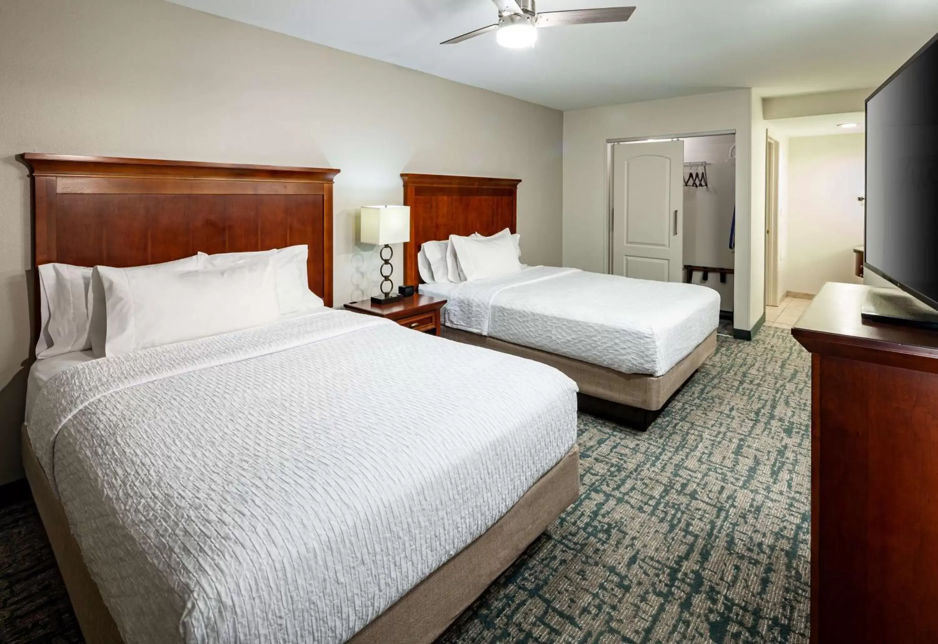 Bed in Homewood Suites by Hilton Gainesville