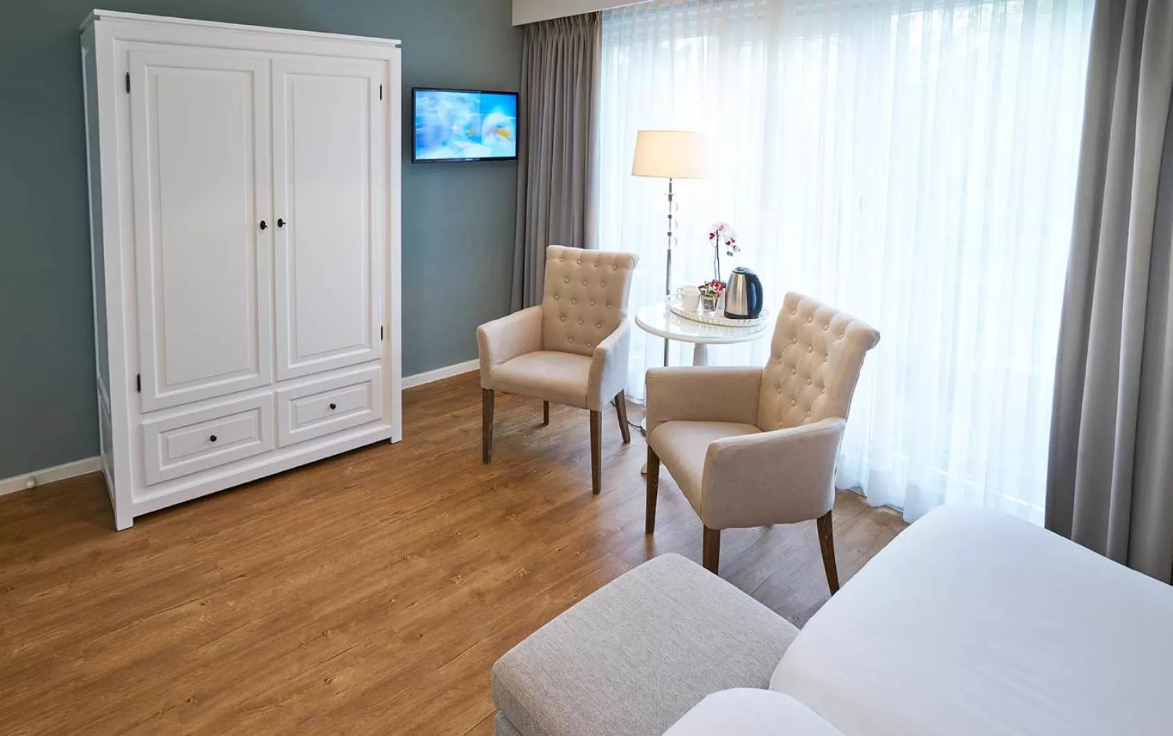 Seating area, Bed in Hotel Brull