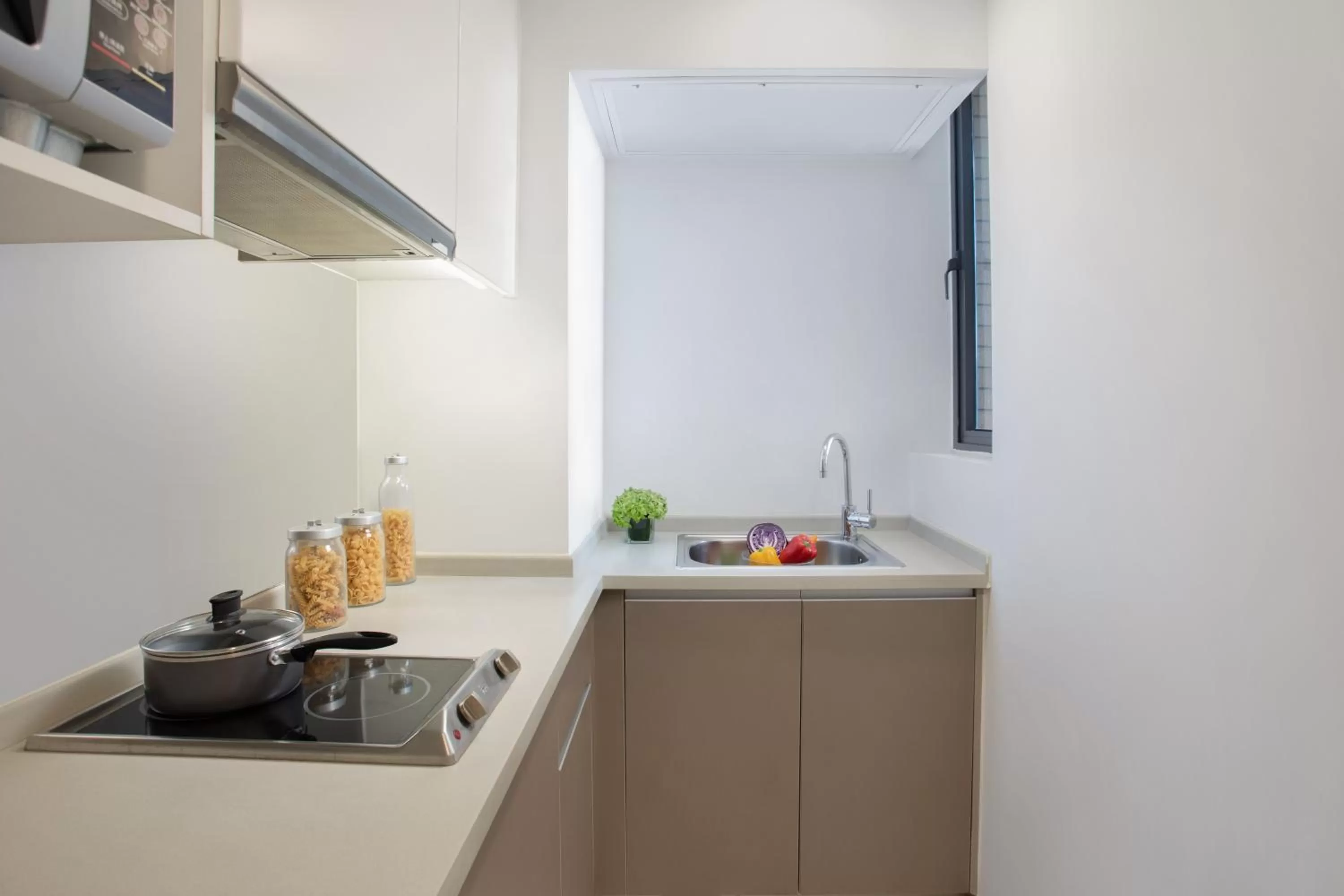 Kitchen or kitchenette in Citadines Xinghai Suzhou