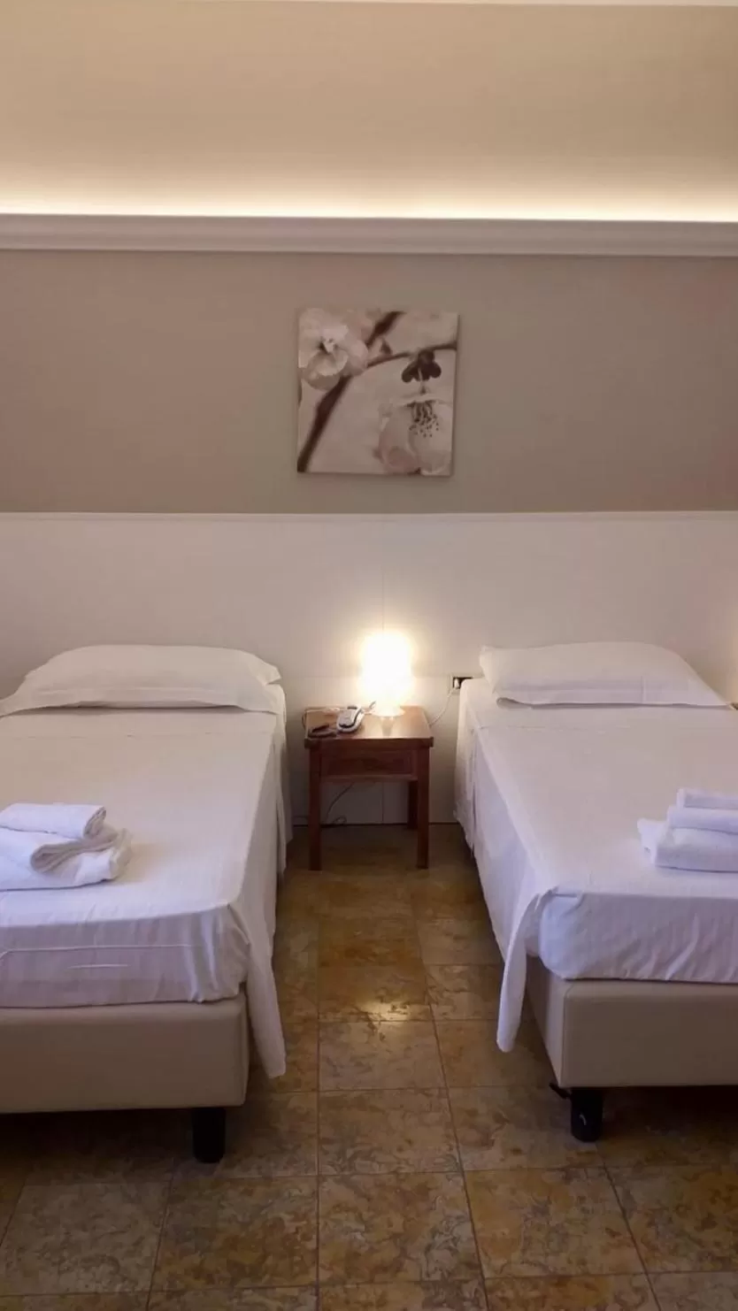 Bed in Hotel Elefante