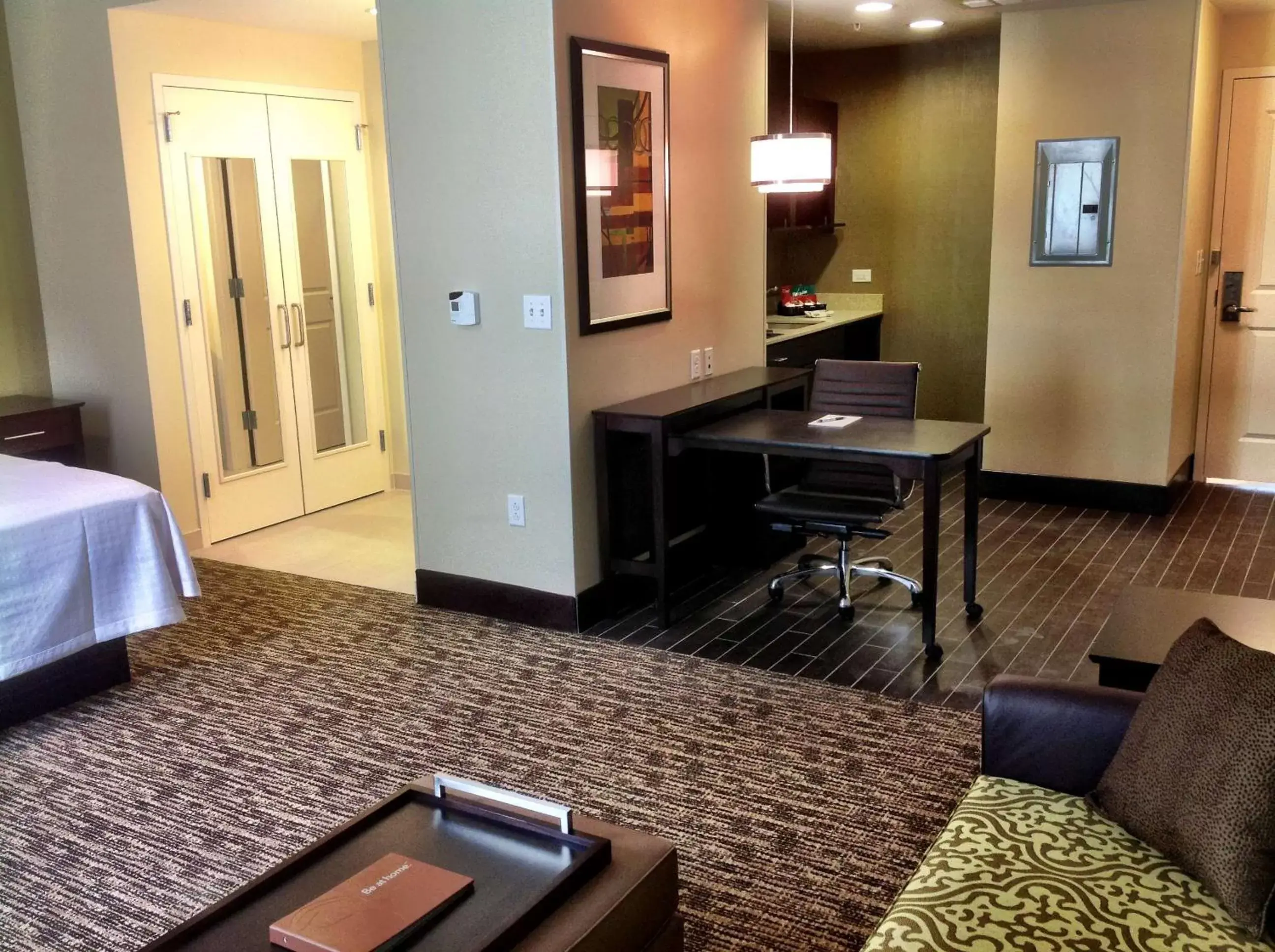 Bed, TV/Entertainment Center in Homewood Suites Dallas Downtown