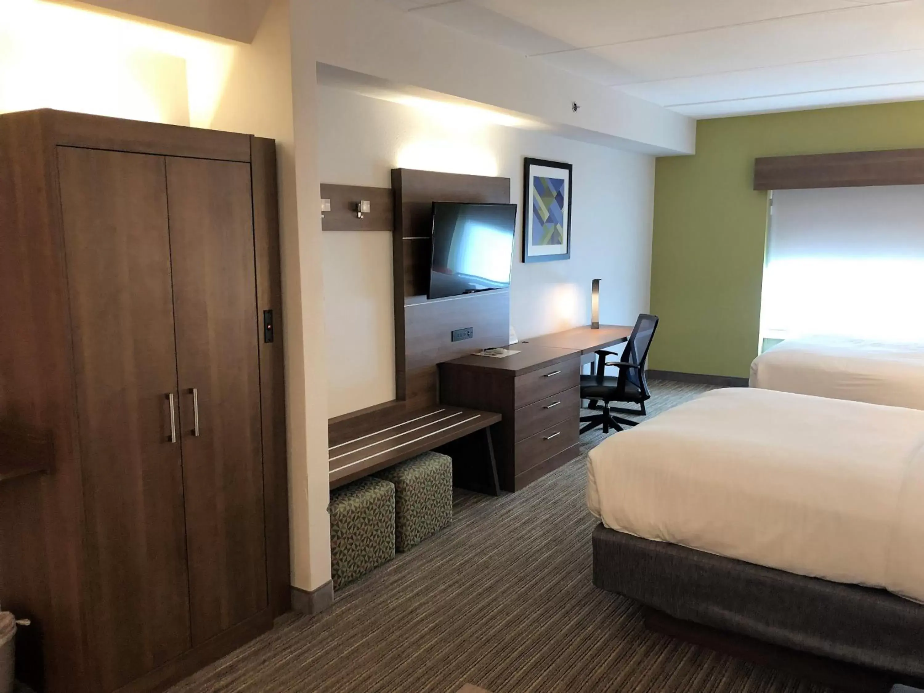 Photo of the whole room, TV/Entertainment Center in Holiday Inn Express Hotel & Suites Jacksonville North-Fernandina, an IHG Hotel