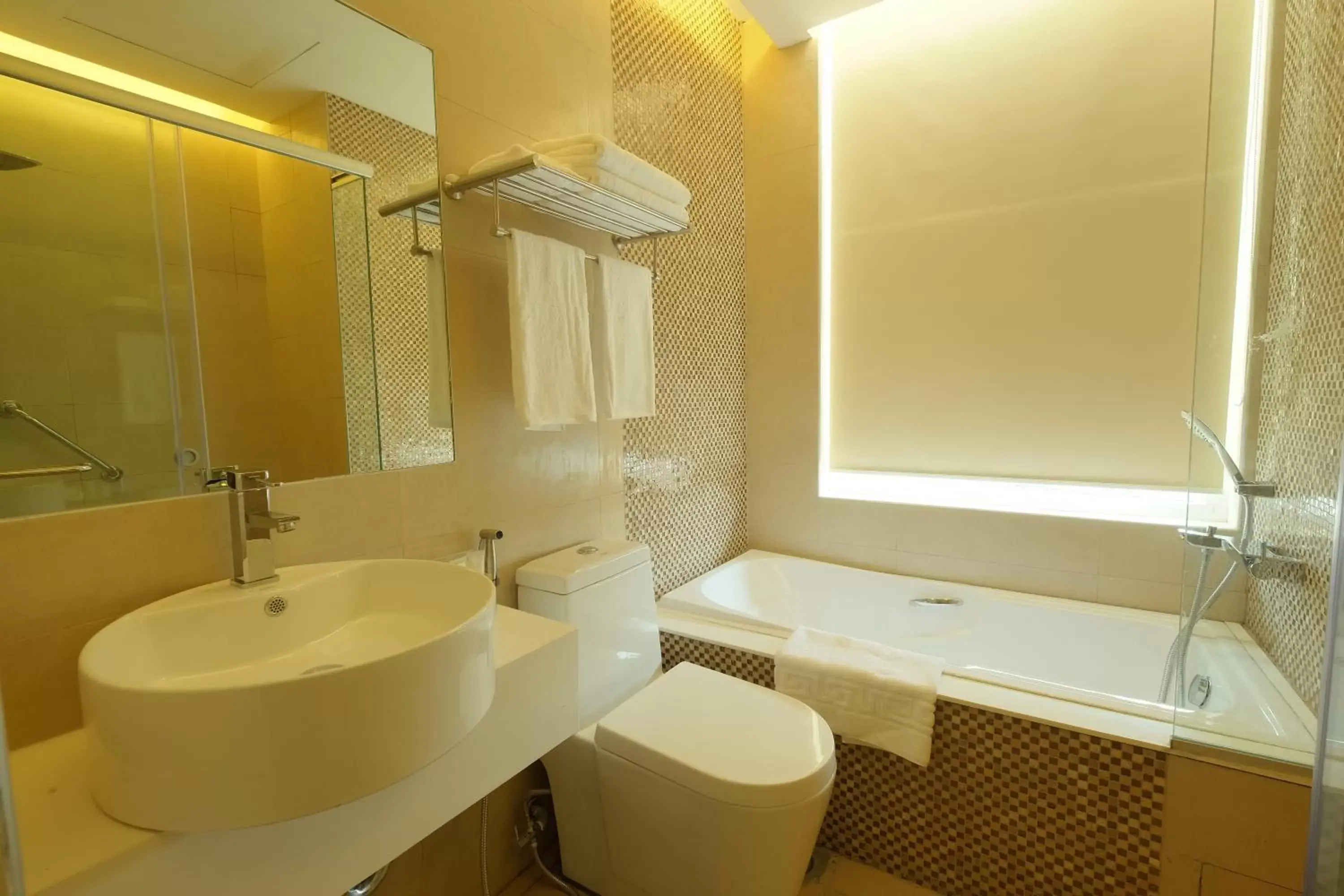 Bathroom in One Central Hotel & Suites