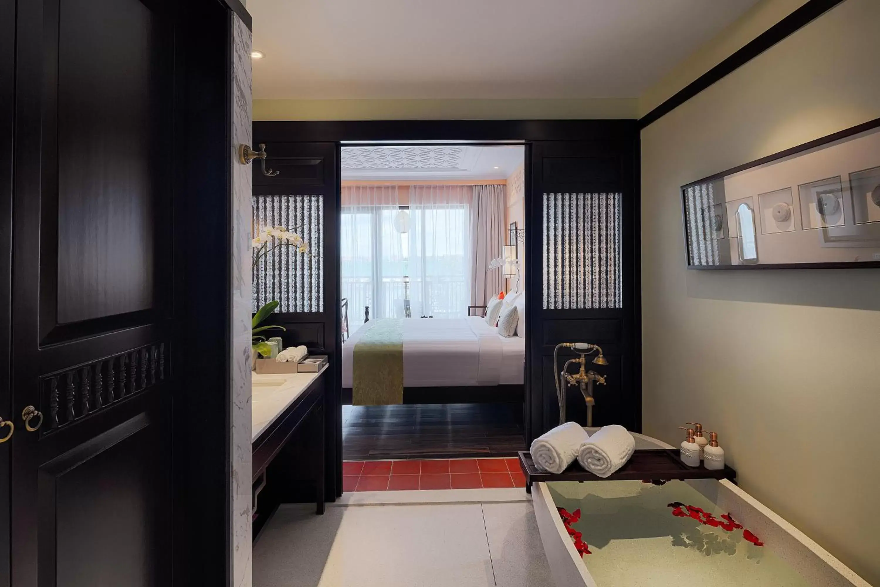 Shower, Bed in Little Riverside Hoi An . A Luxury Hotel & Spa Shower, Bed in Little Riverside Hoi An . A Luxury Hotel & Spa