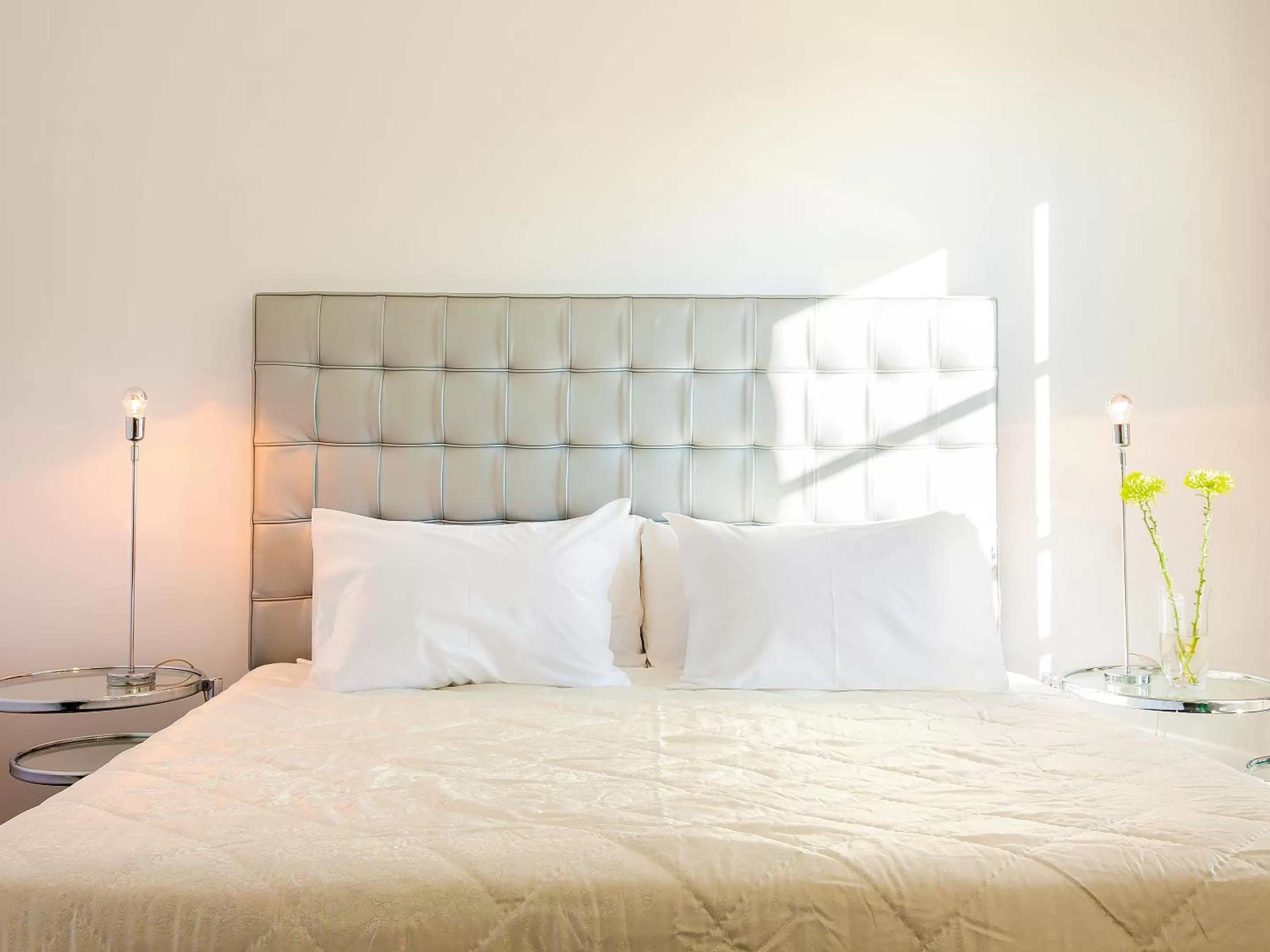 Bed in Grecotel Pallas Athena