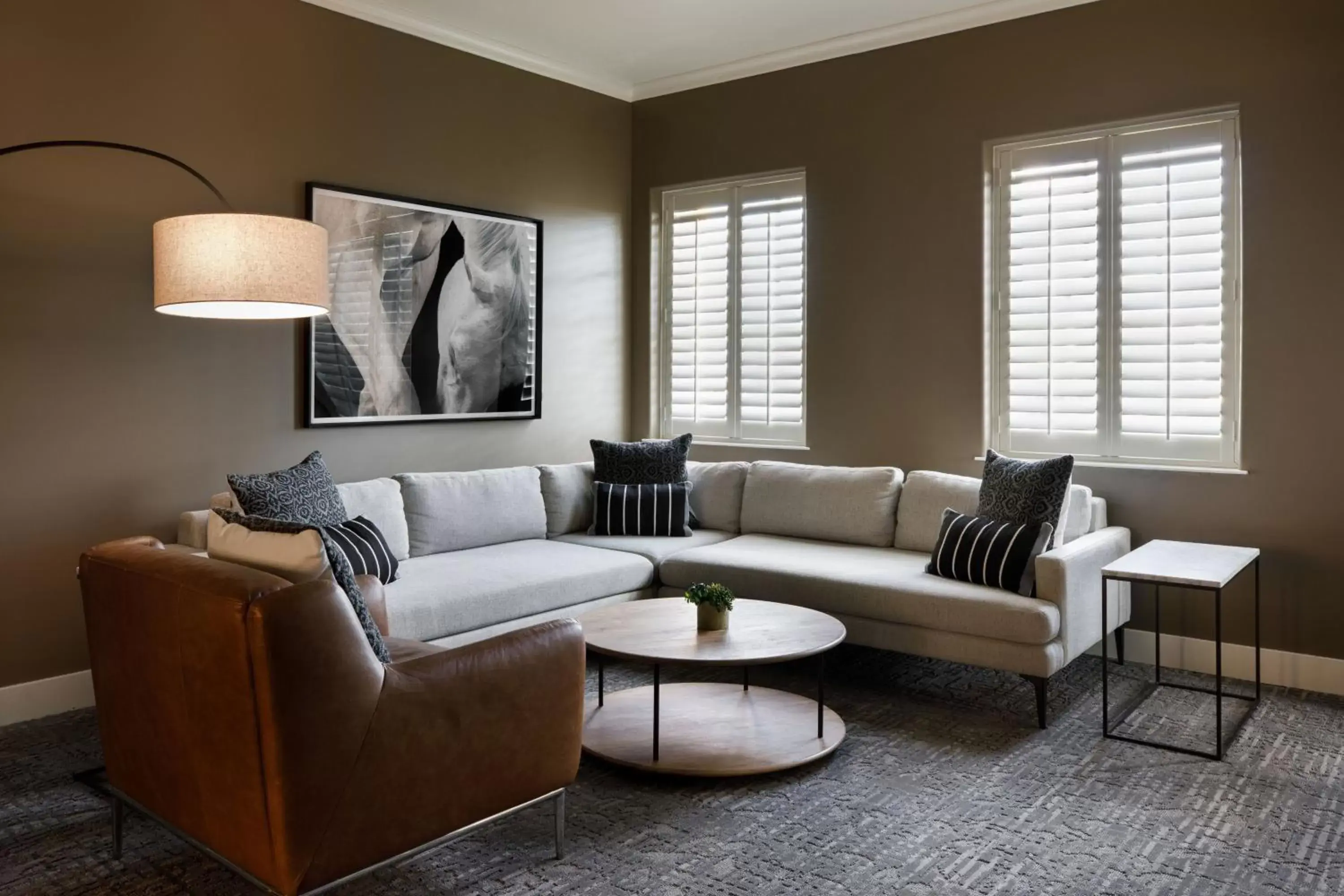 Bedroom, Seating Area in Ambassador Hotel Oklahoma City, Autograph Collection